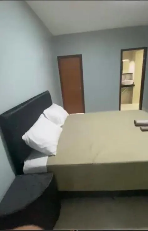 Bed in España Suites Hotel