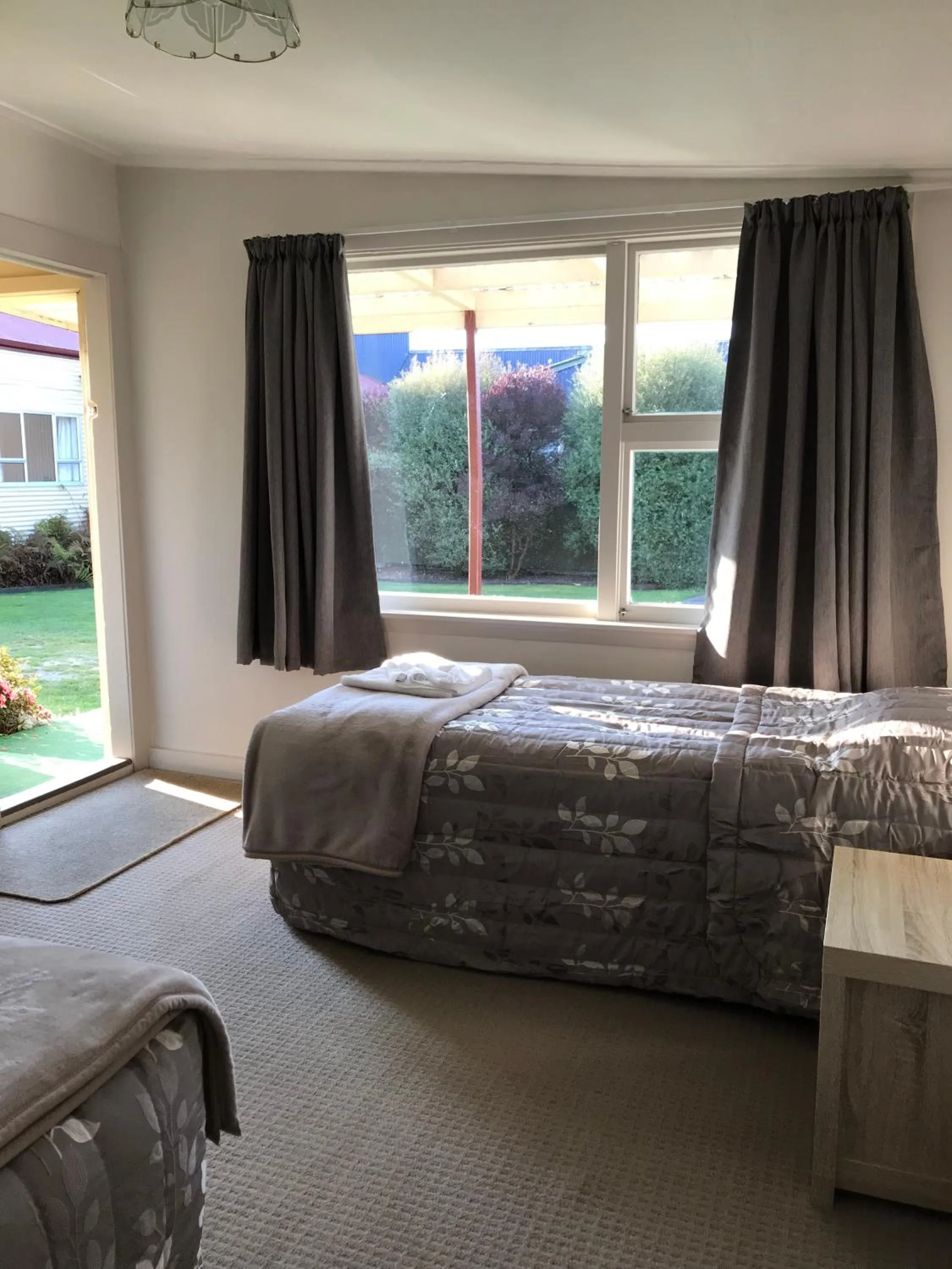 Bed in Lantern Court Motel