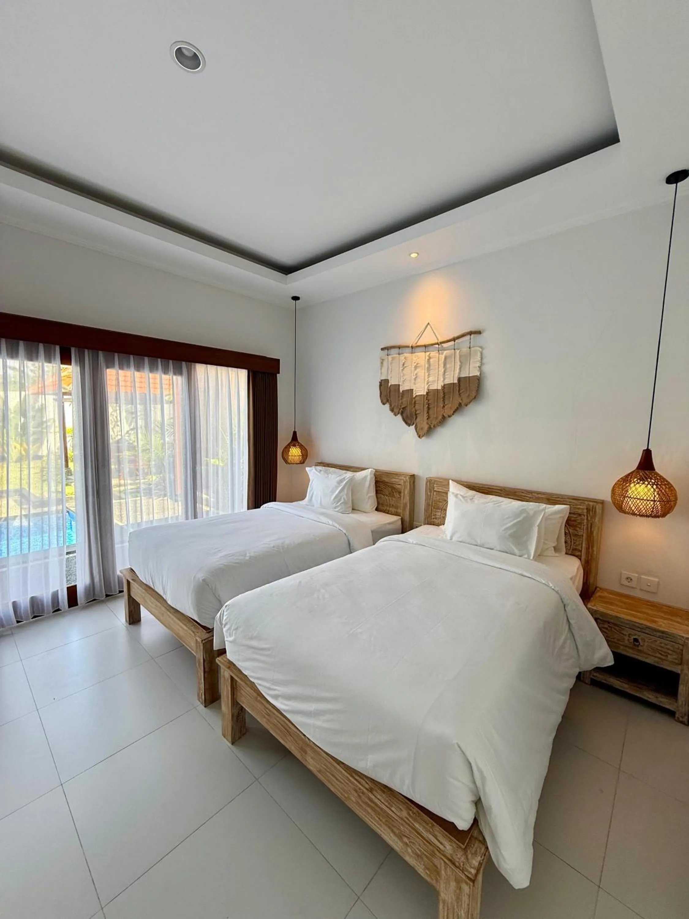 Bed in Kubu Garden Suites & Villas Nusa Dua