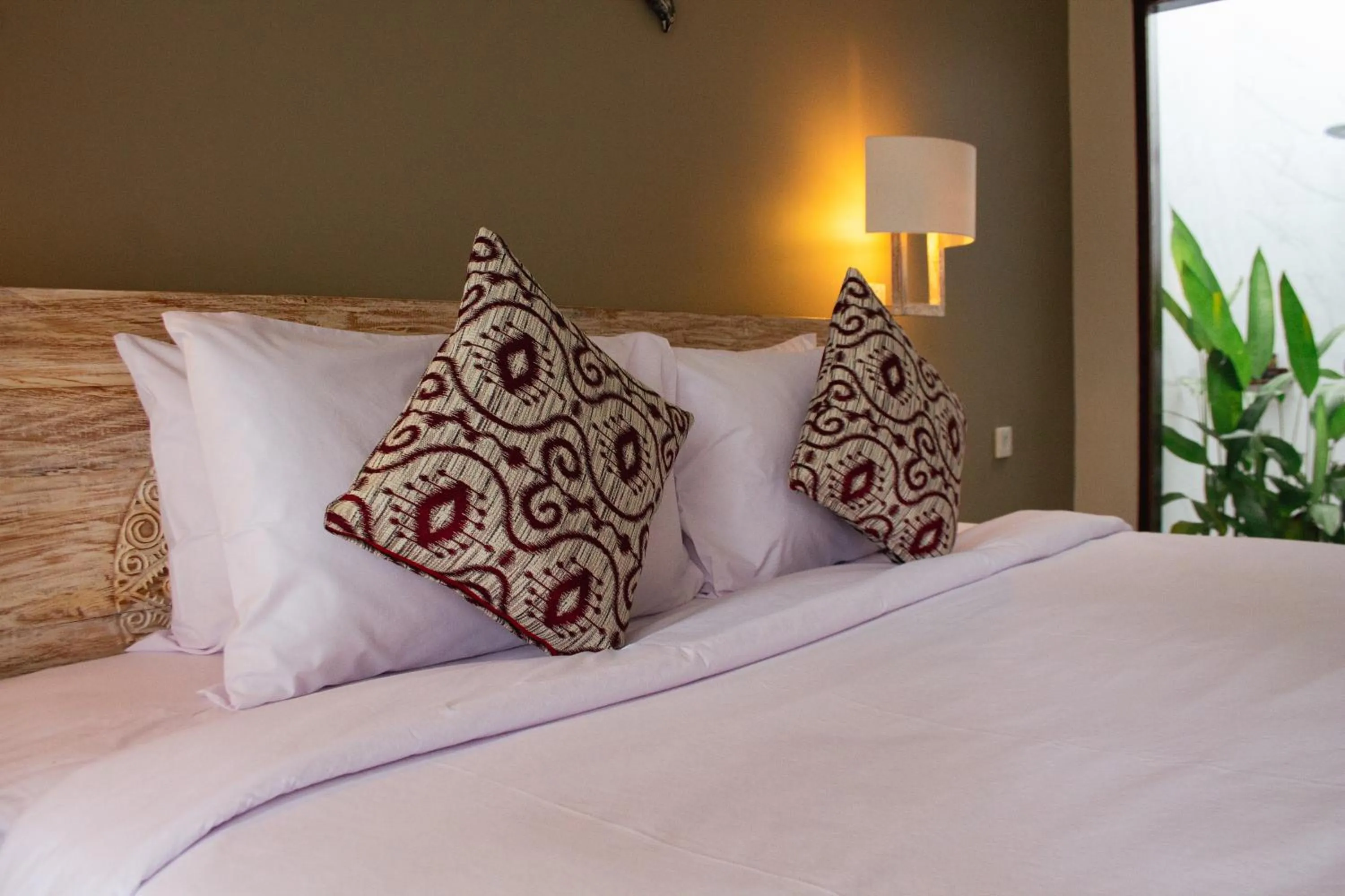 Bed in Kubu Garden Suites & Villas Nusa Dua