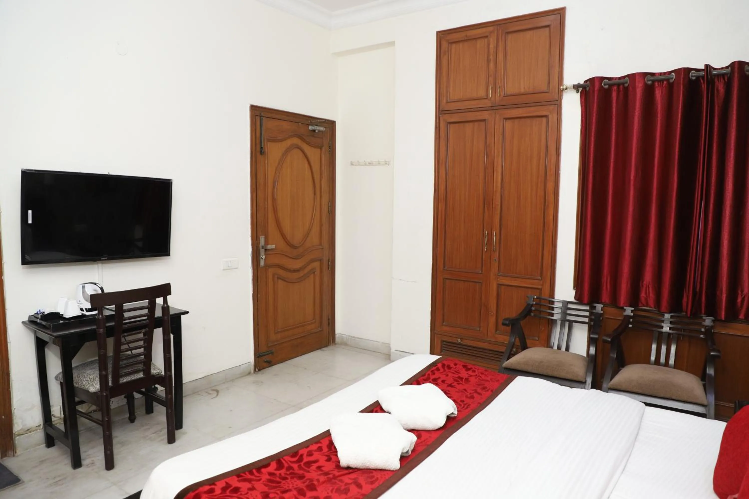 Photo of the whole room, Bed in Hotel Ashray Noida