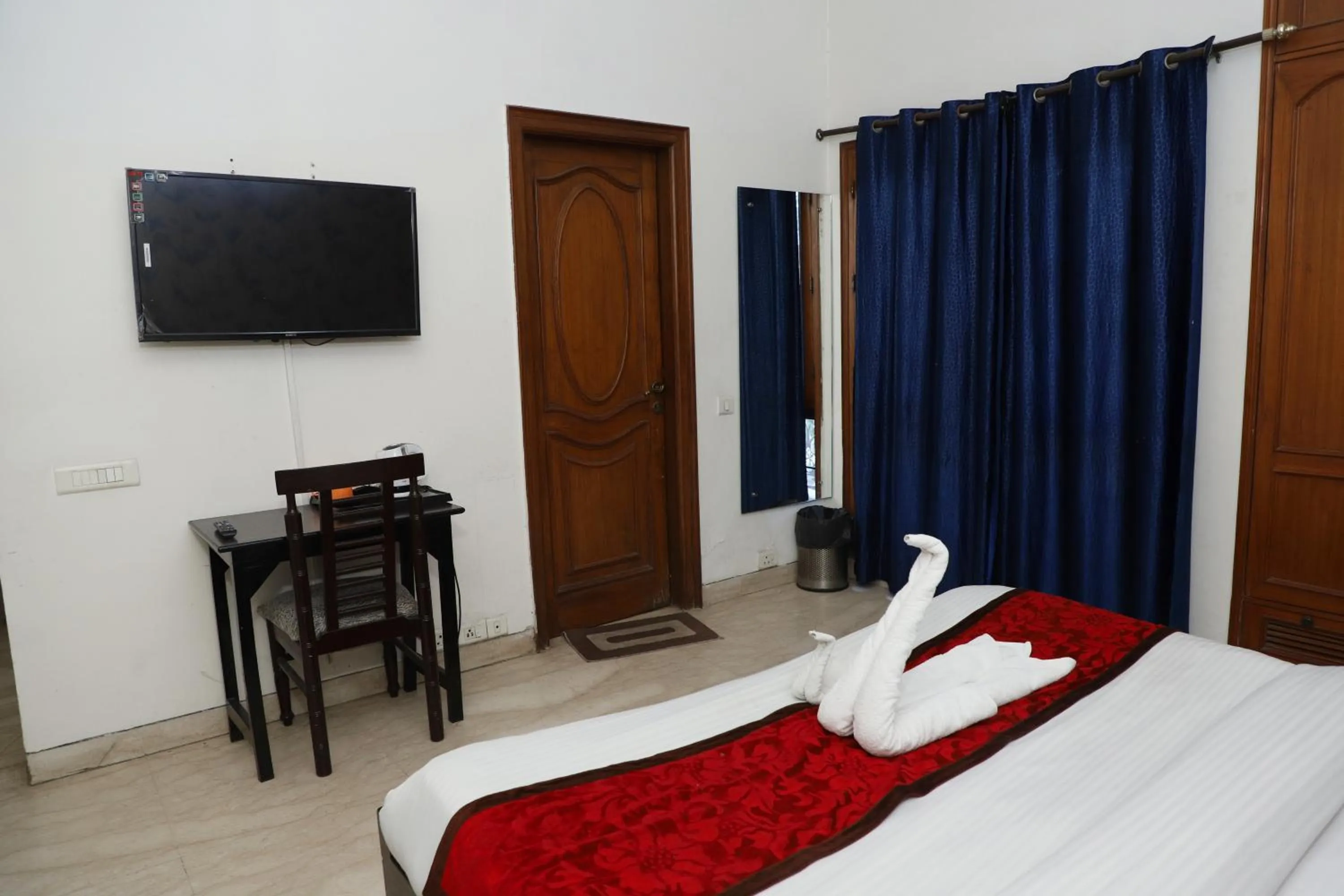 Bathroom, Bed in Hotel Ashray Noida