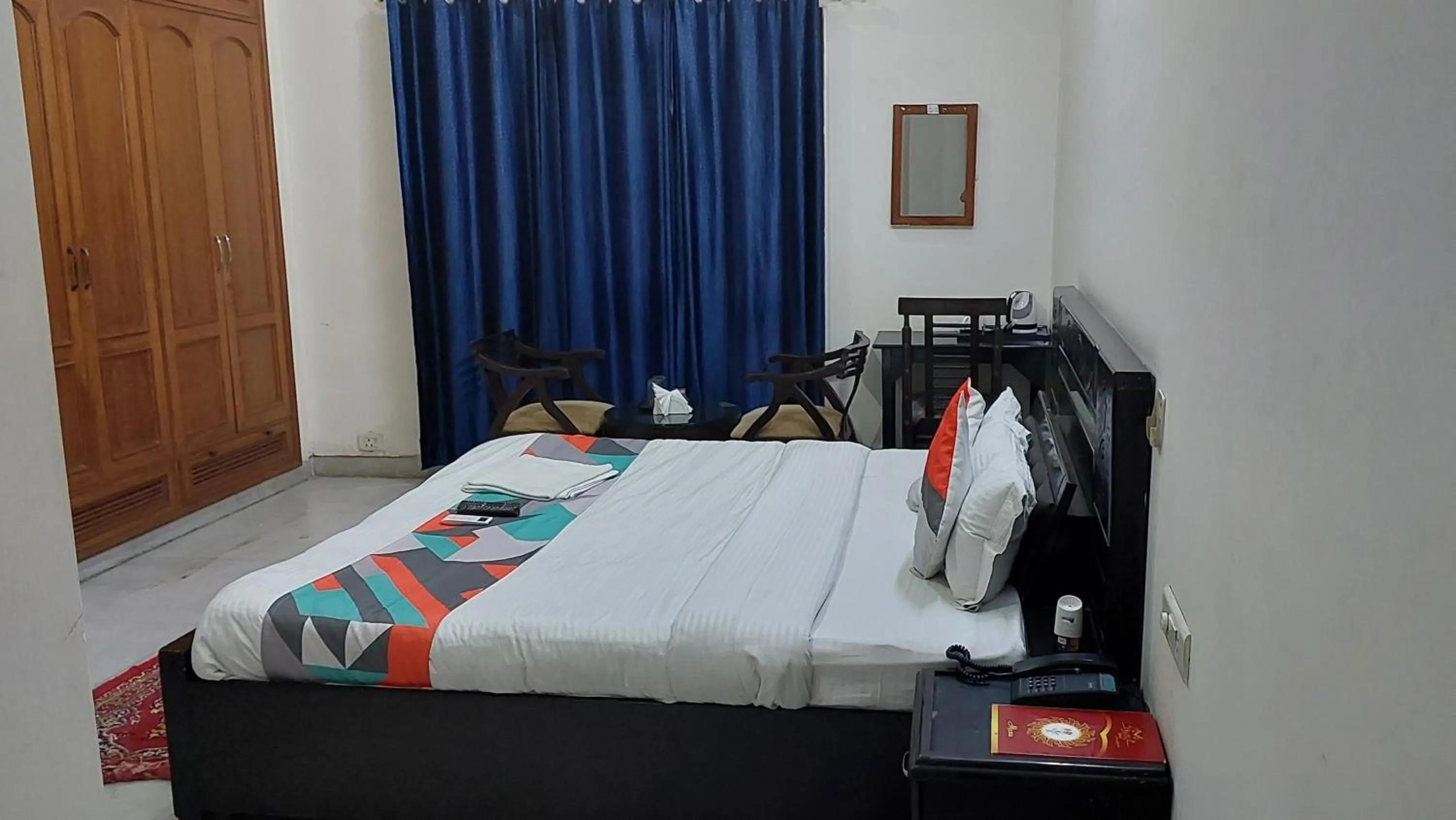 Bed in Hotel Ashray Noida