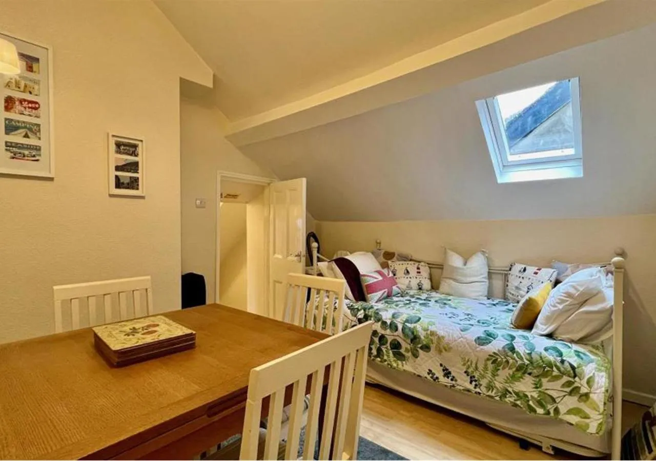 Dining area, Bed in Luxury 4 Bedroom Seaside Apartment - Glan Y Werydd House