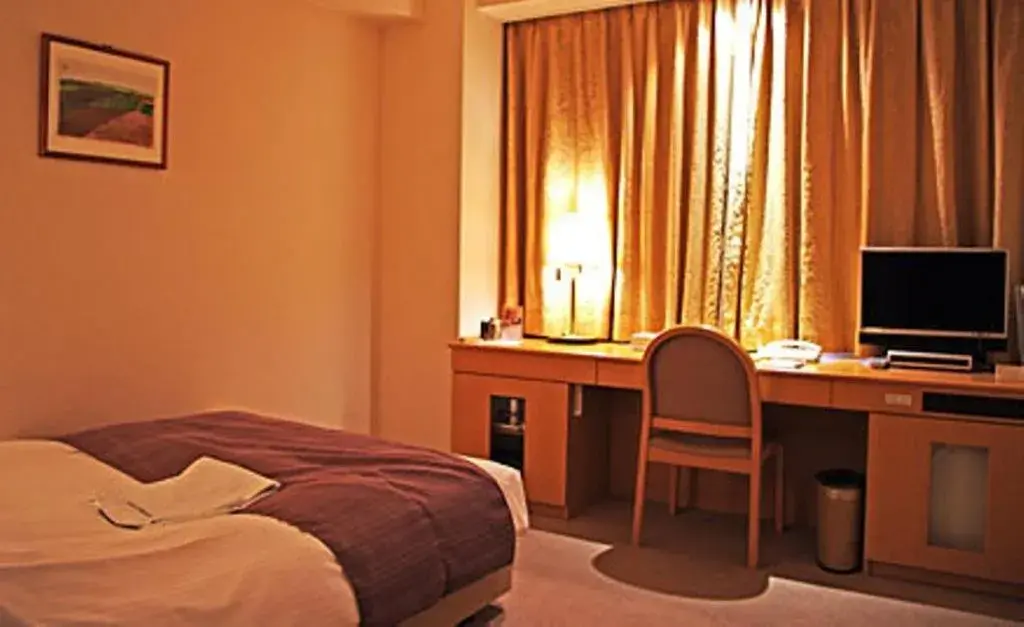 Photo of the whole room, Bed in Kitami Pierson Hotel Photo of the whole room, Bed in Kitami Pierson Hotel