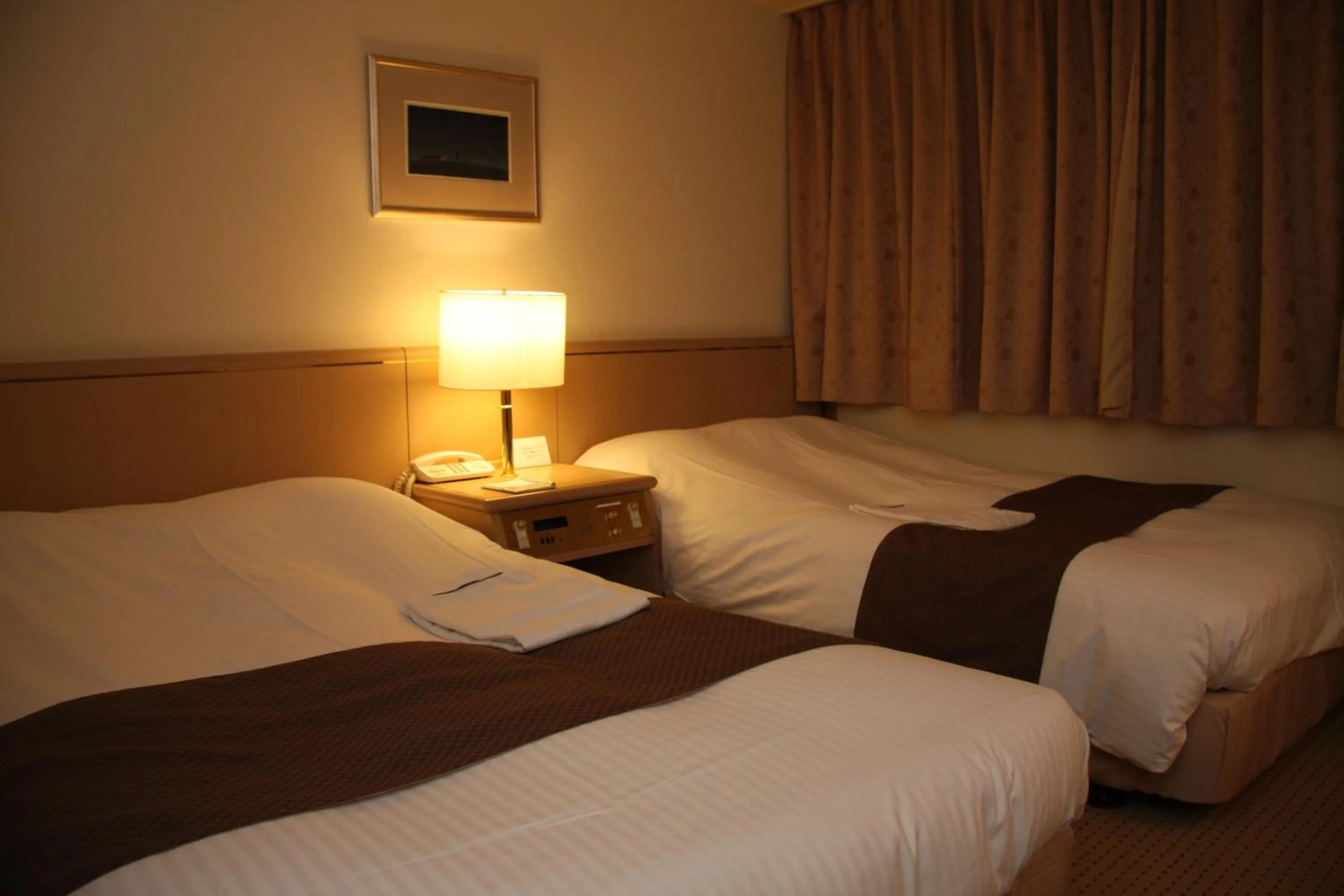 Bed in Kitami Pierson Hotel