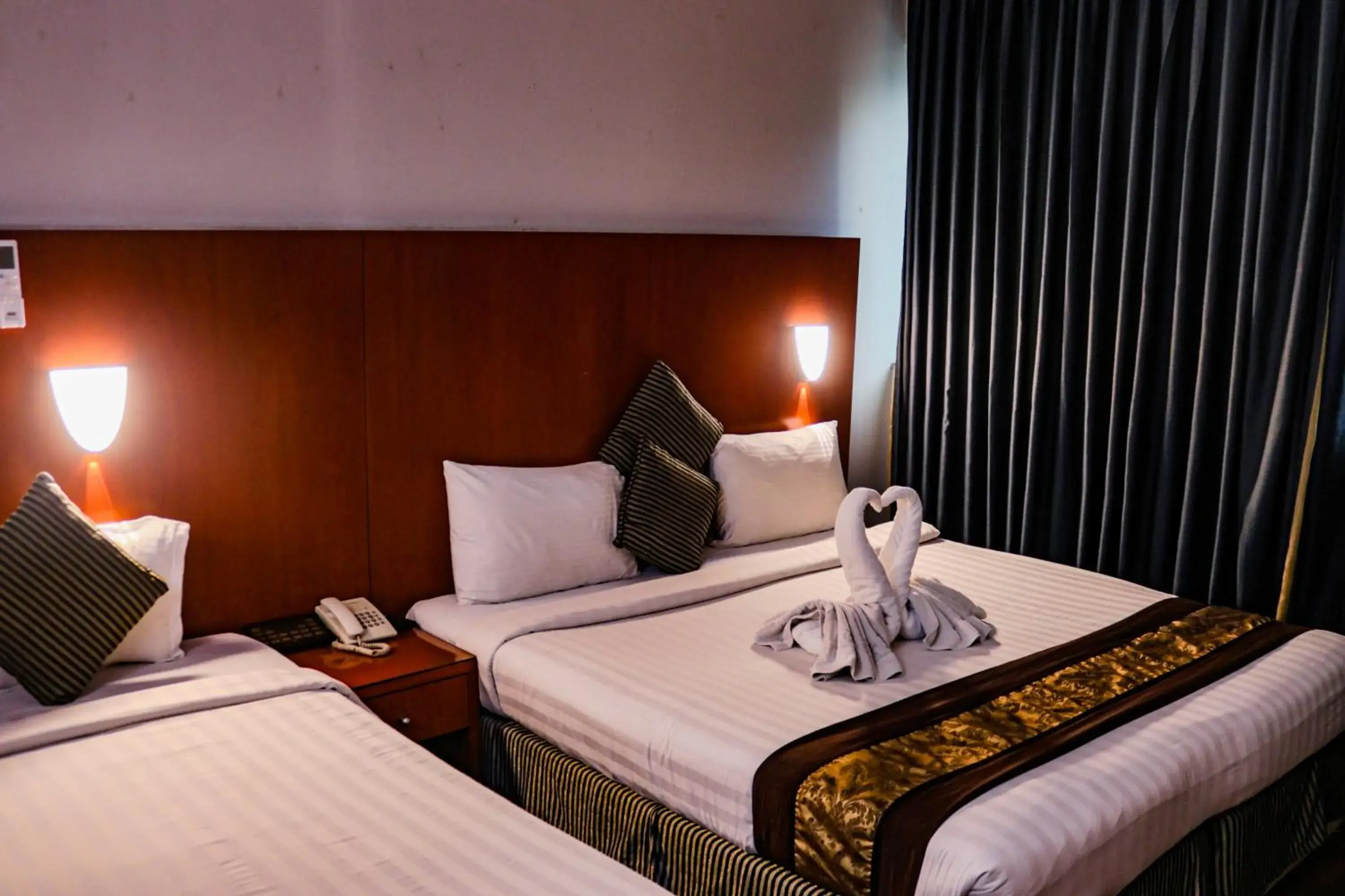 Bed in BOONMAX Hotel Bed in BOONMAX Hotel