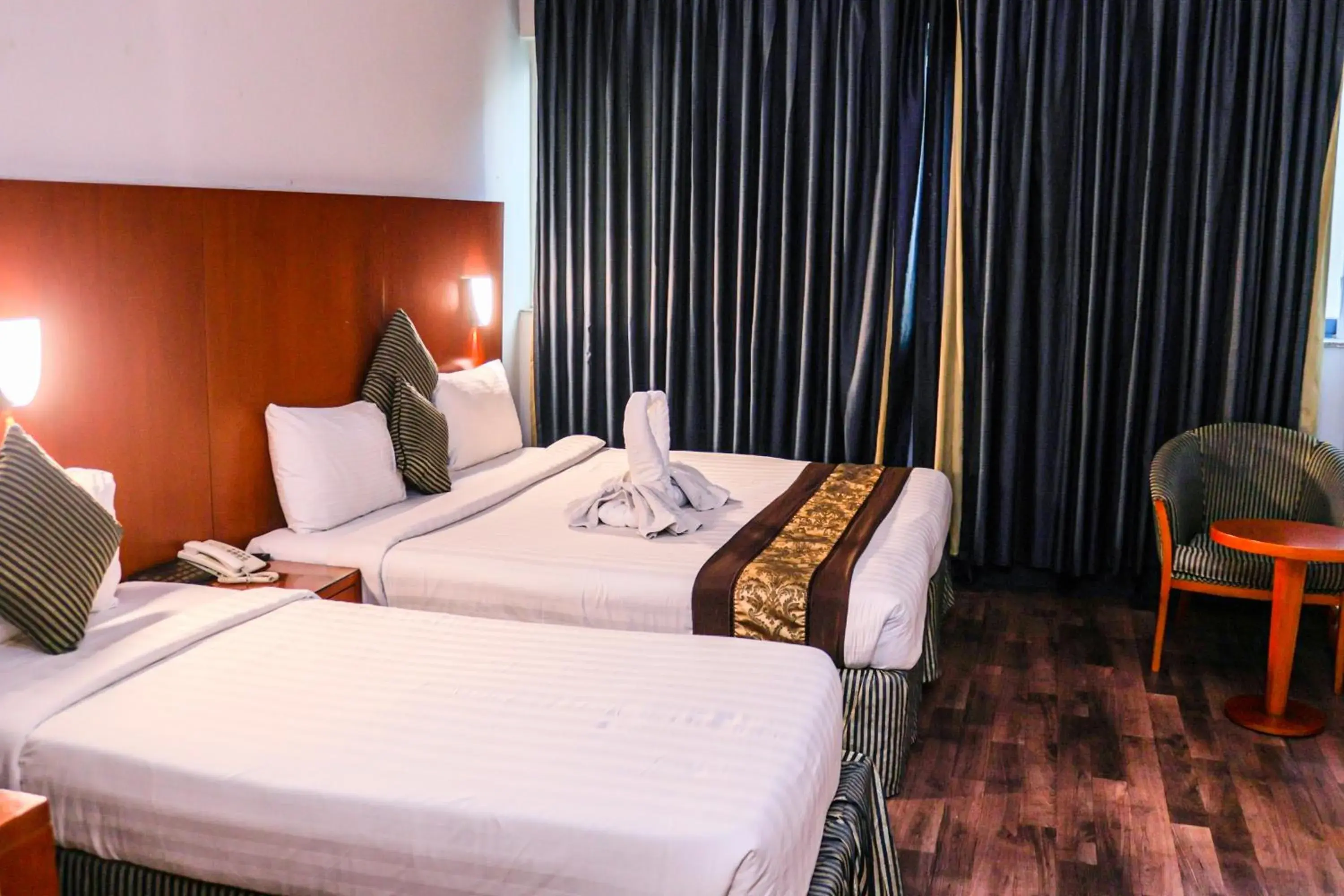 Bed in BOONMAX Hotel Bed in BOONMAX Hotel