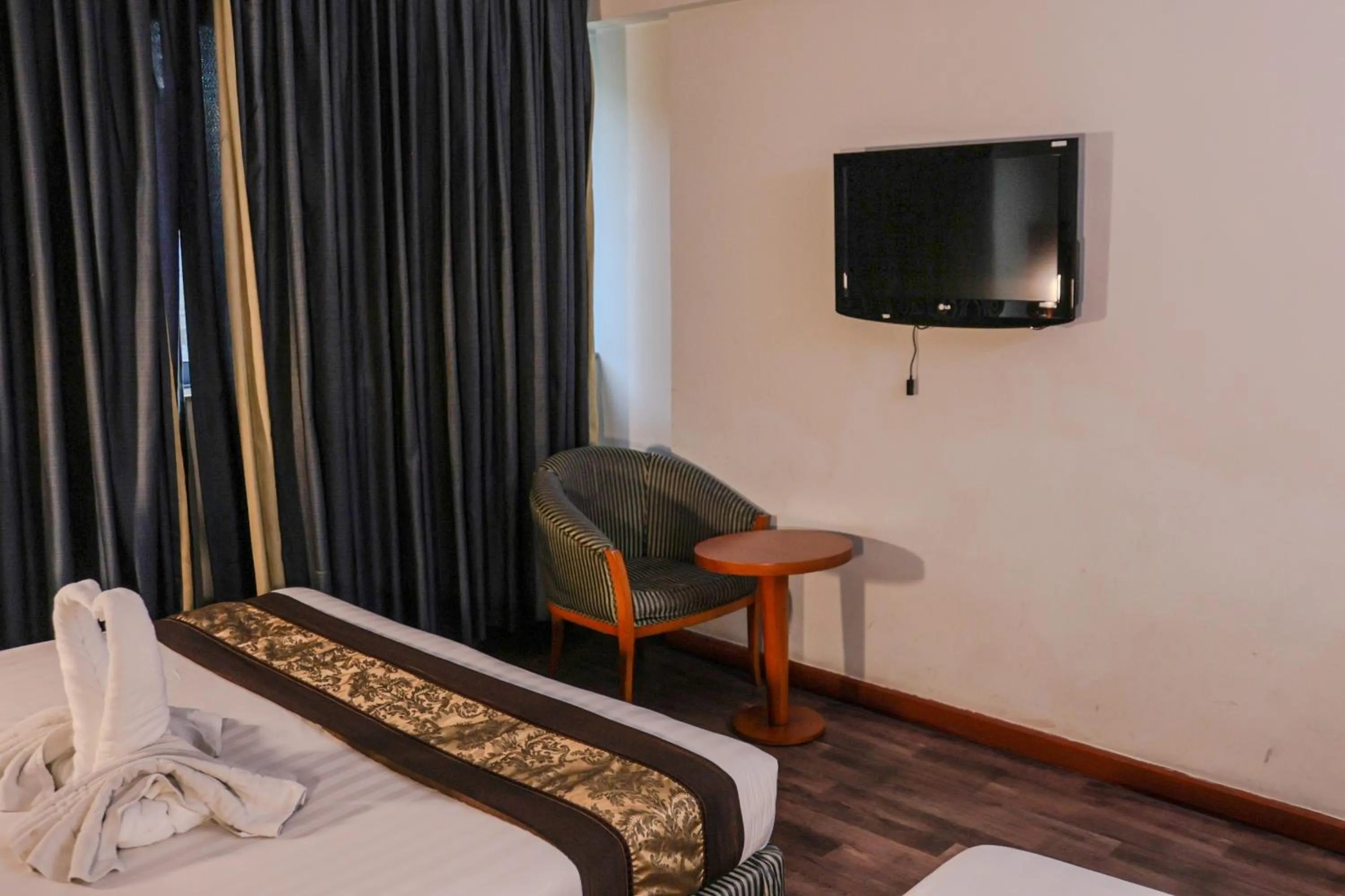 TV and multimedia, Bed in BOONMAX Hotel
