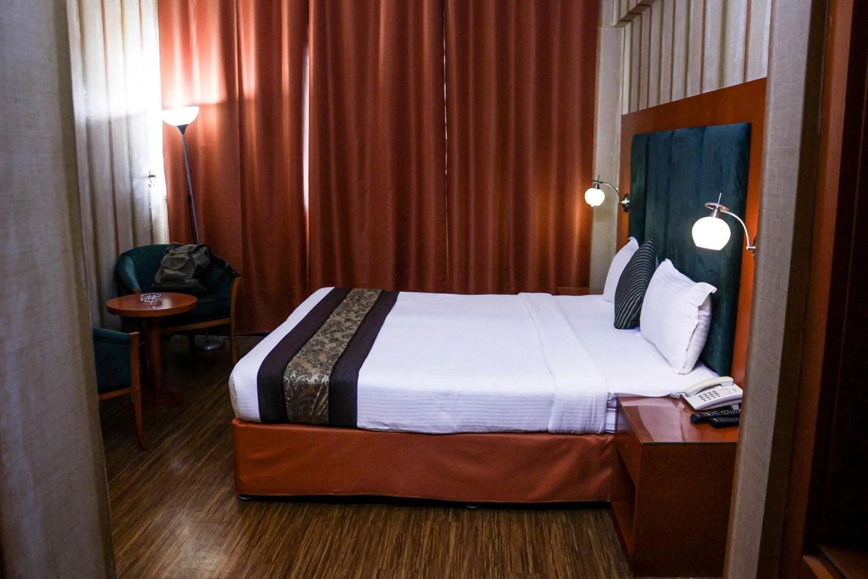 Photo of the whole room, Bed in BOONMAX Hotel