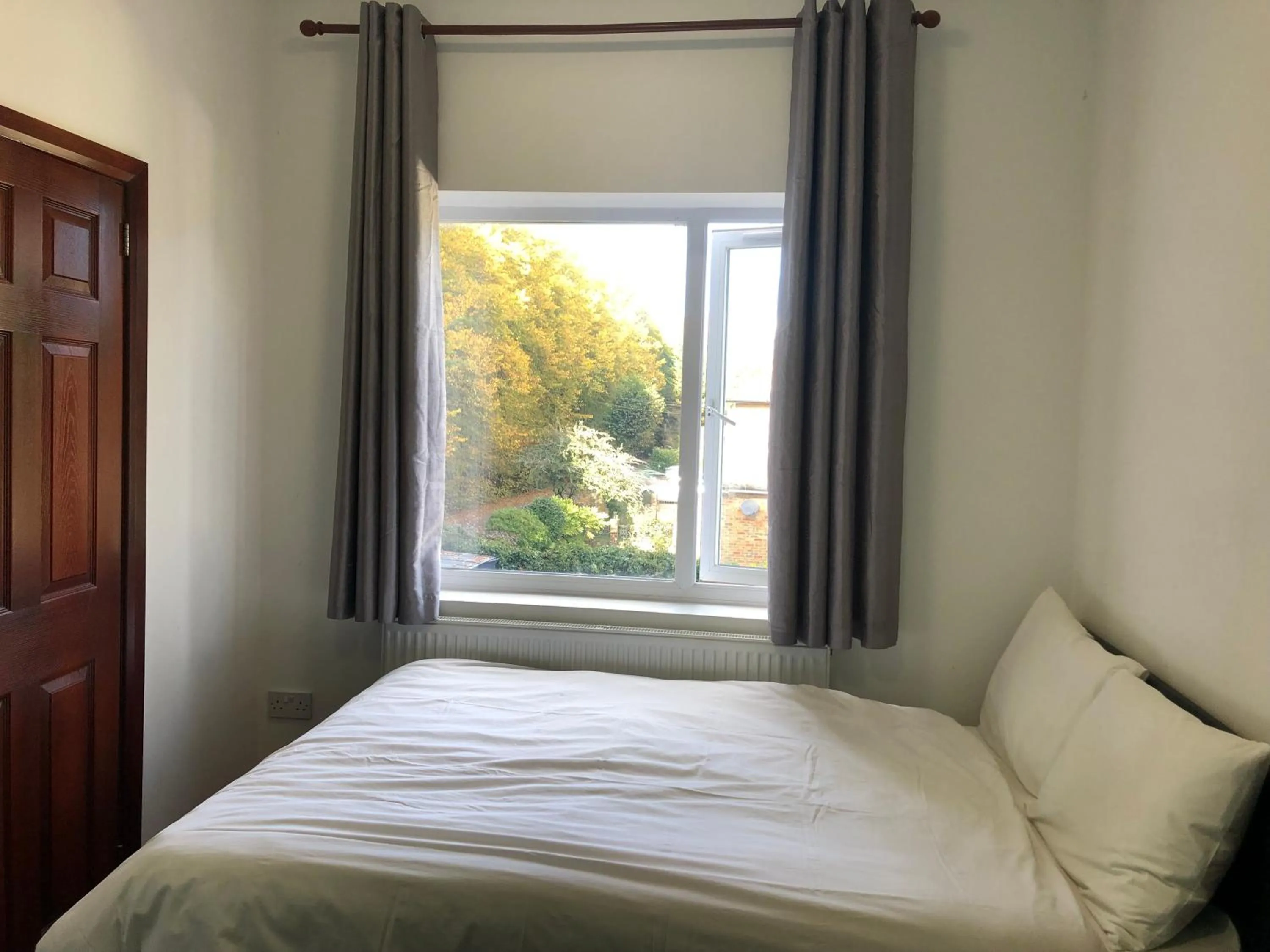 Bed in Lyttleton Guest House Limited