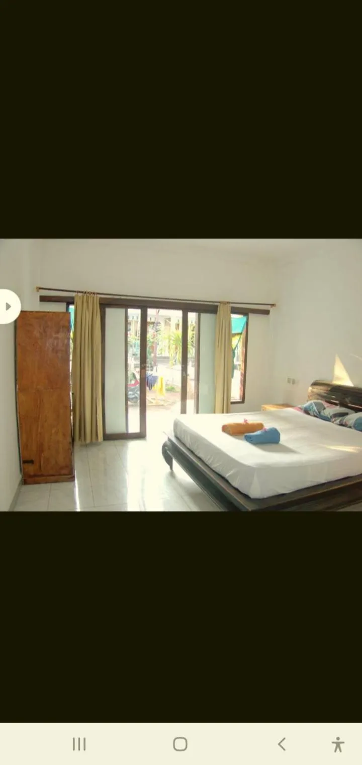 Bed in BUKIT GARDEN Guest House