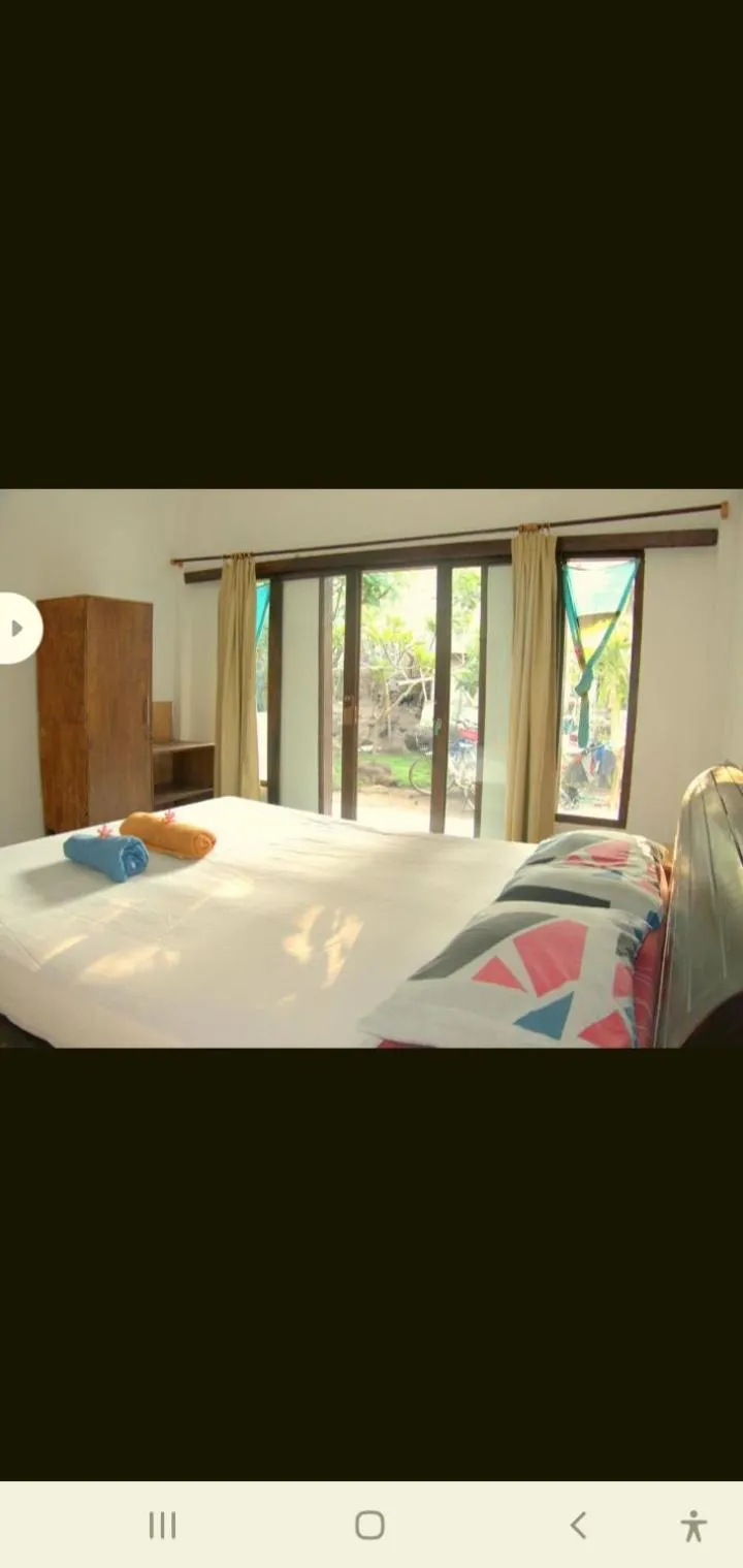 Bed in BUKIT GARDEN Guest House