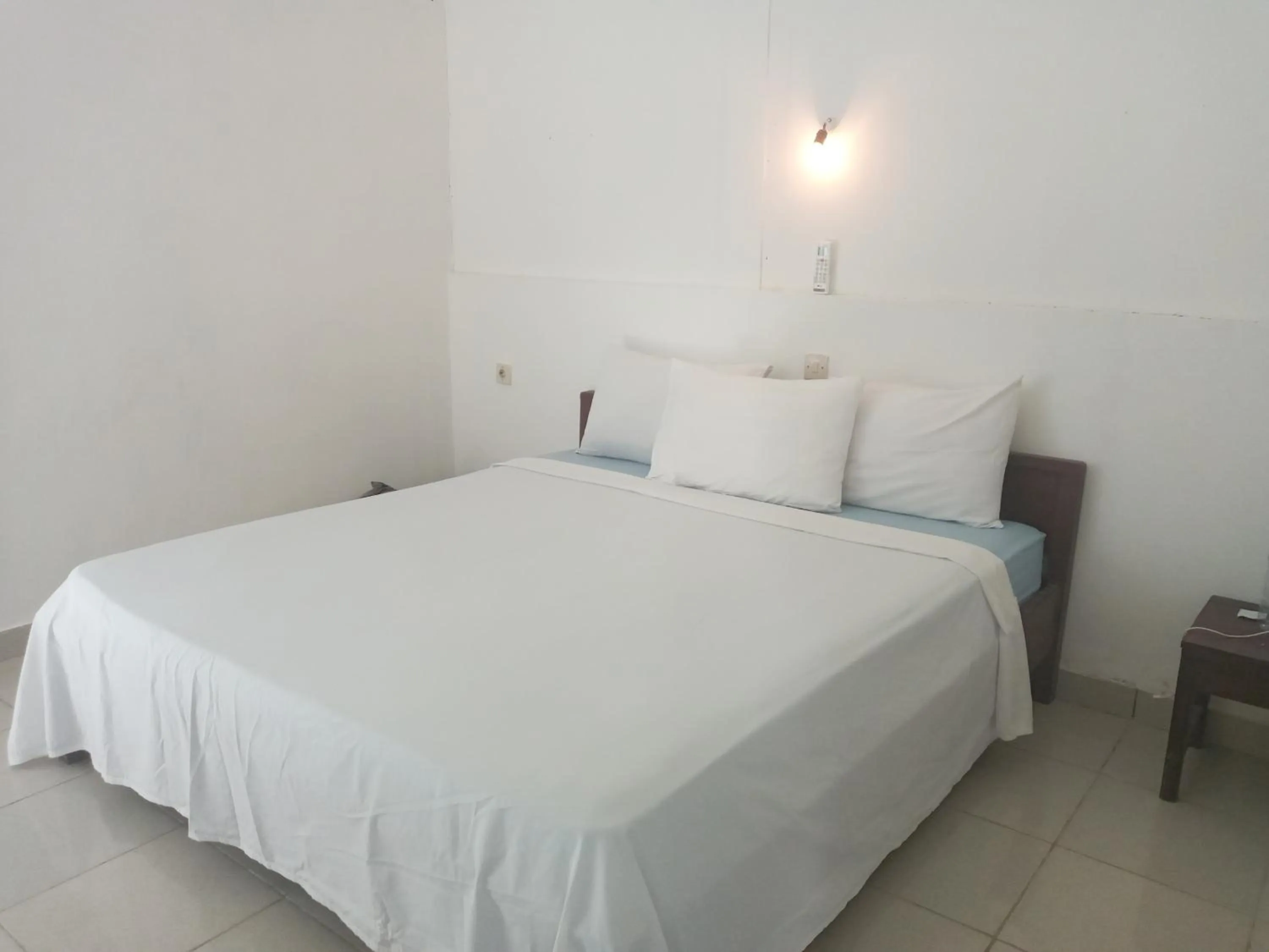 Bed in BUKIT GARDEN Guest House