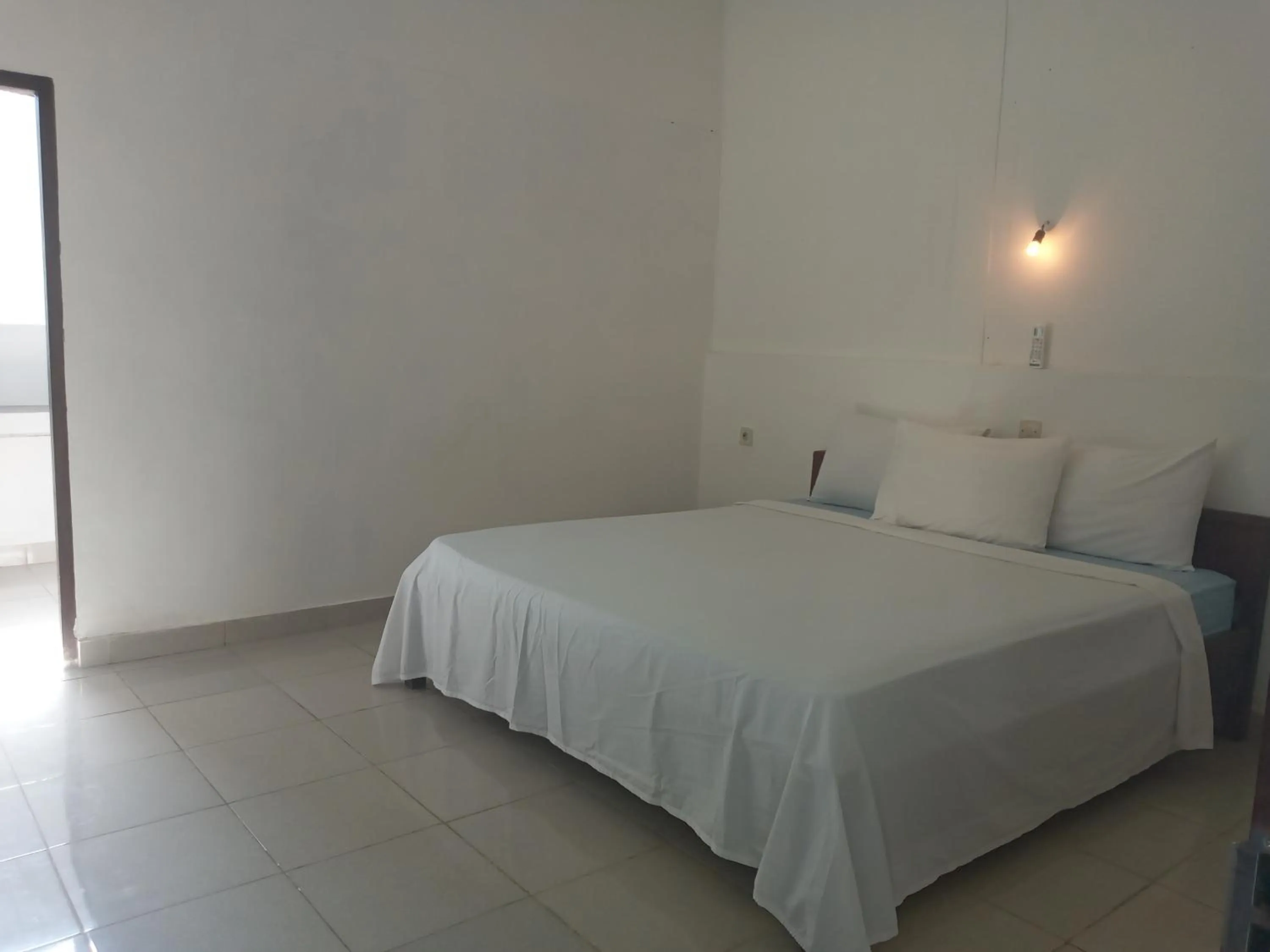 Bed in BUKIT GARDEN Guest House