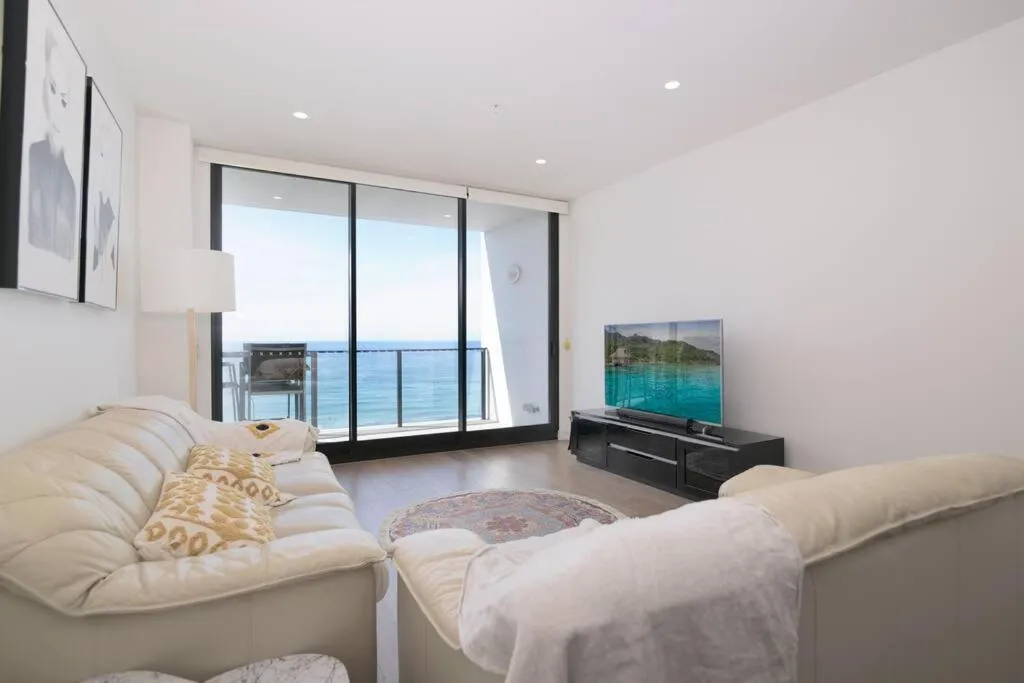 Living room, Bed in Arena Newcastle Beach