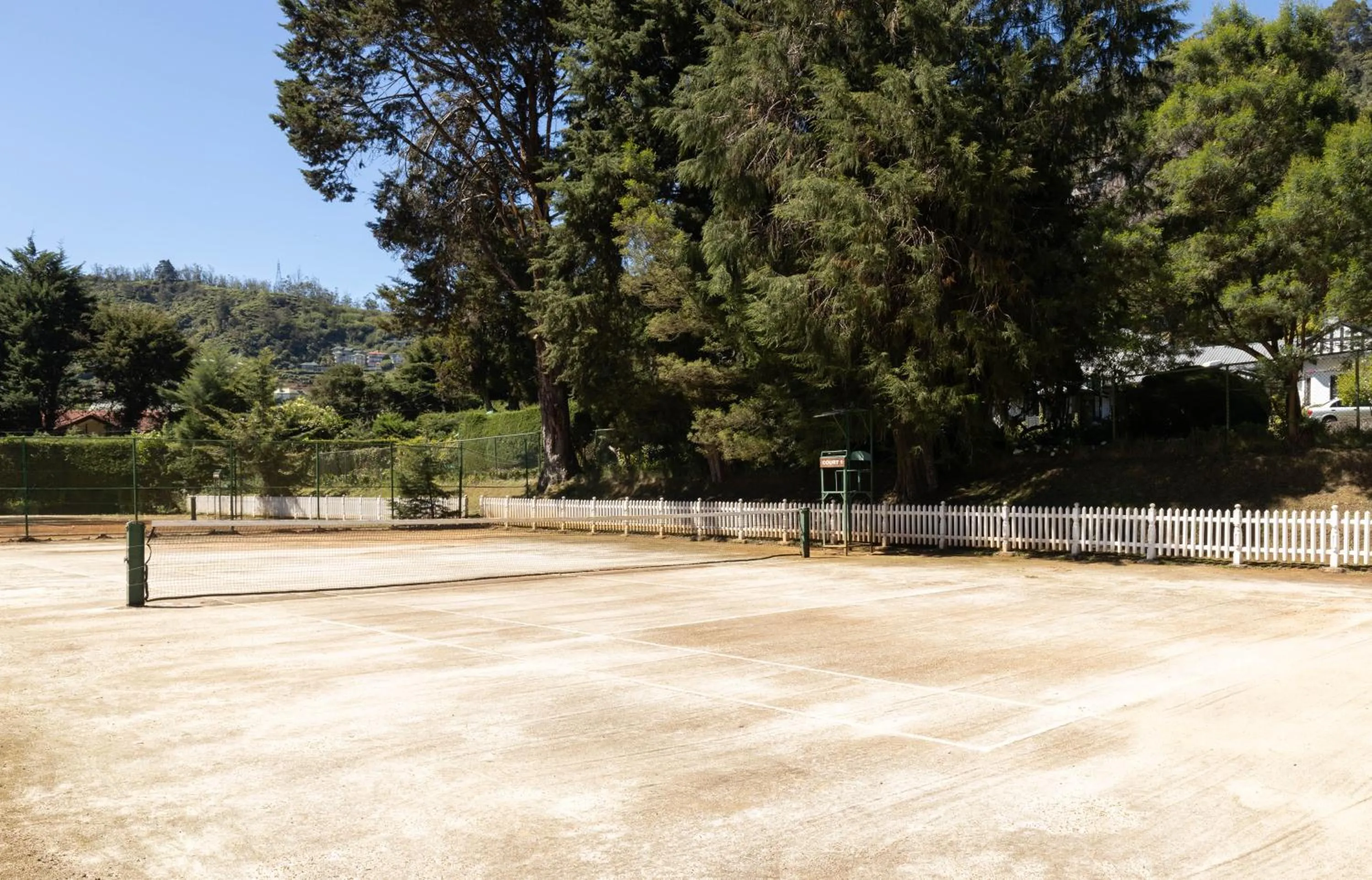 Tennis court in The Hill Club