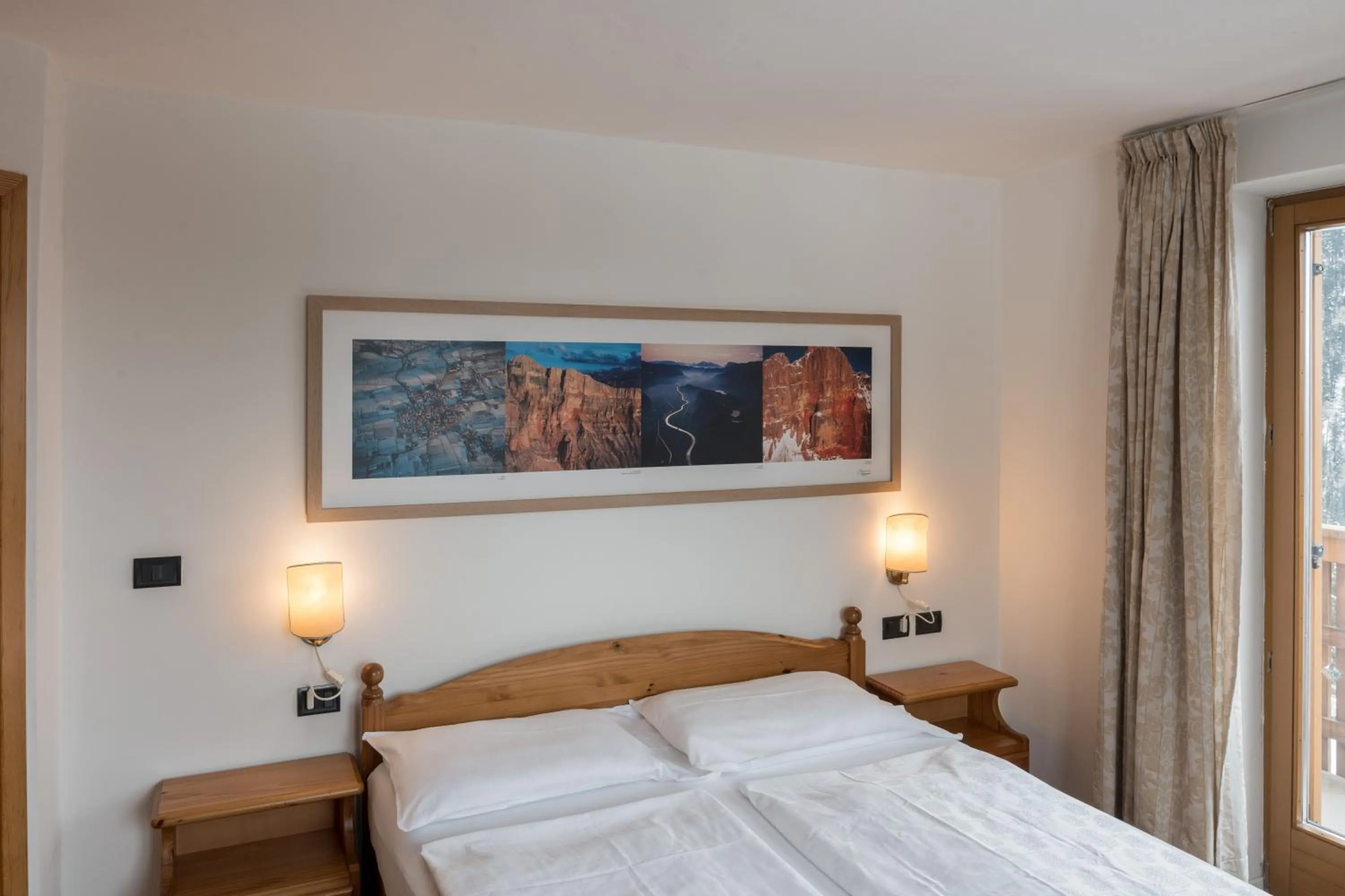 Bed in PLOSE Parkhotel & Residence