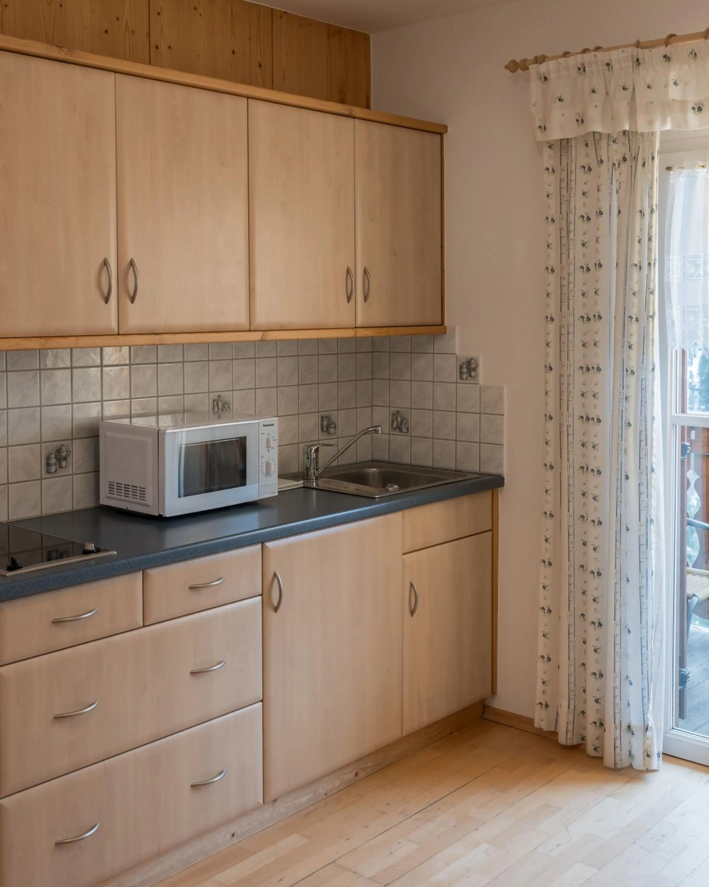 Kitchen or kitchenette in PLOSE Parkhotel & Residence