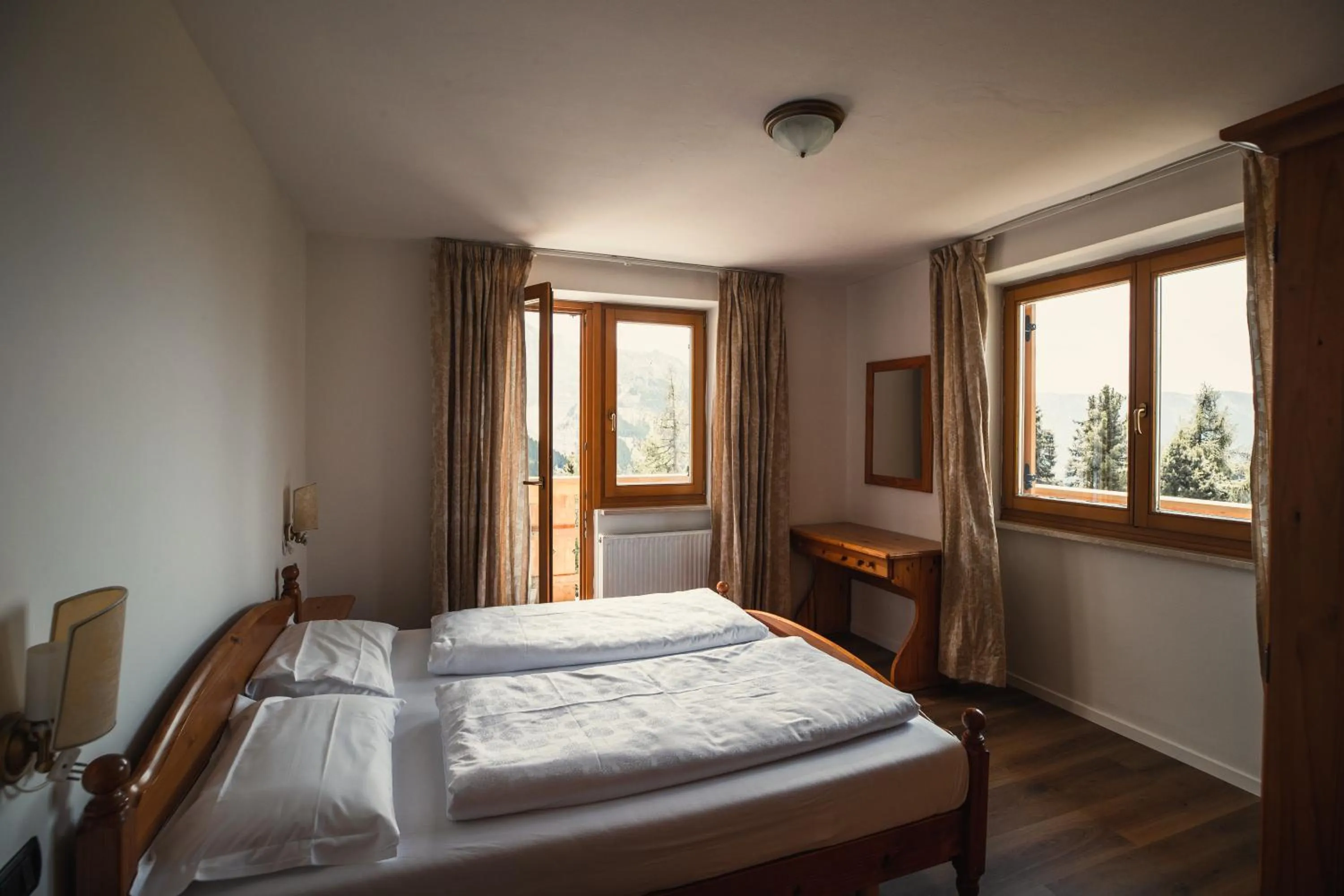 Bedroom, Bed in PLOSE Parkhotel & Residence