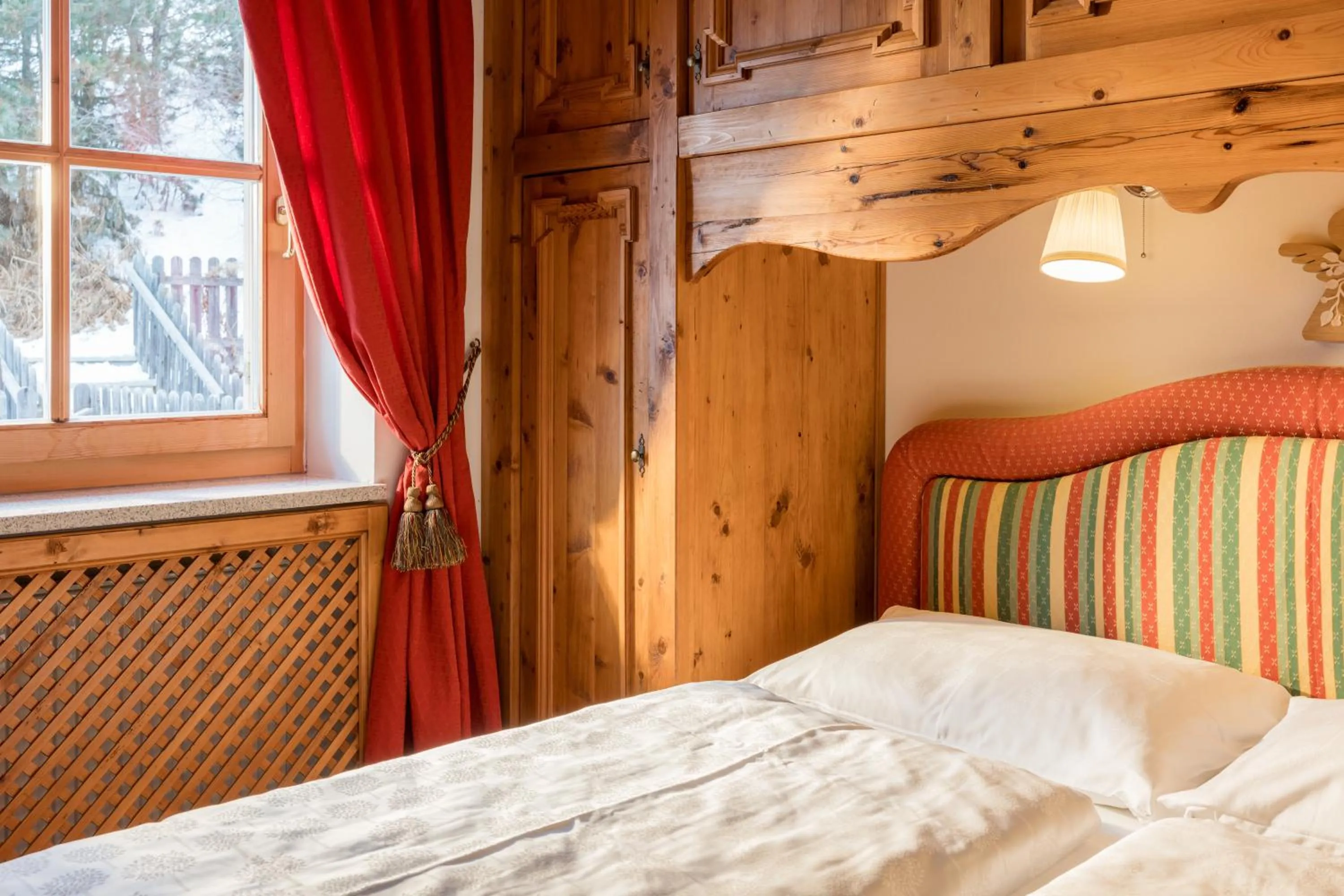 Bed in PLOSE Parkhotel & Residence