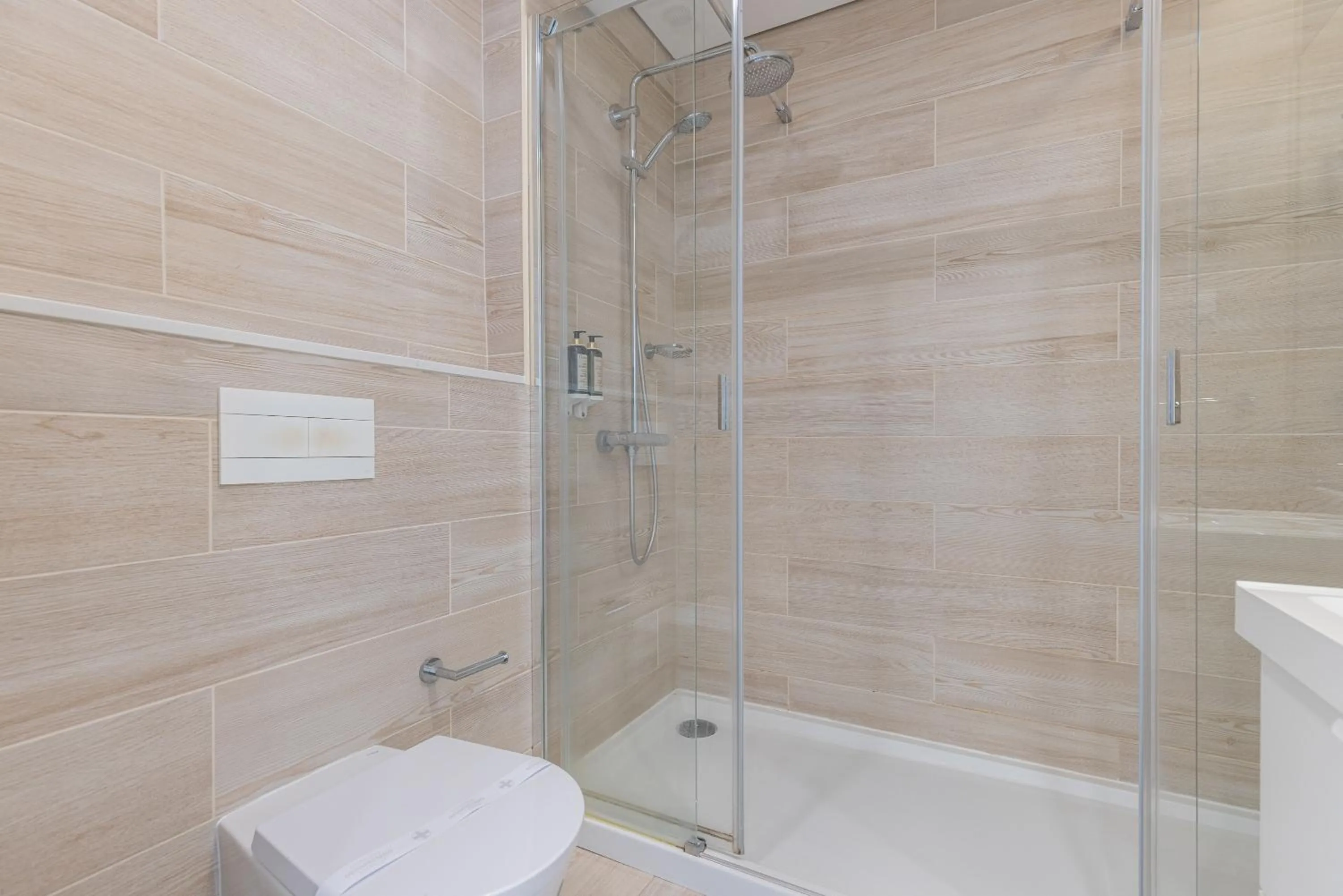 Bathroom in Garcia 28 by LovelyStay