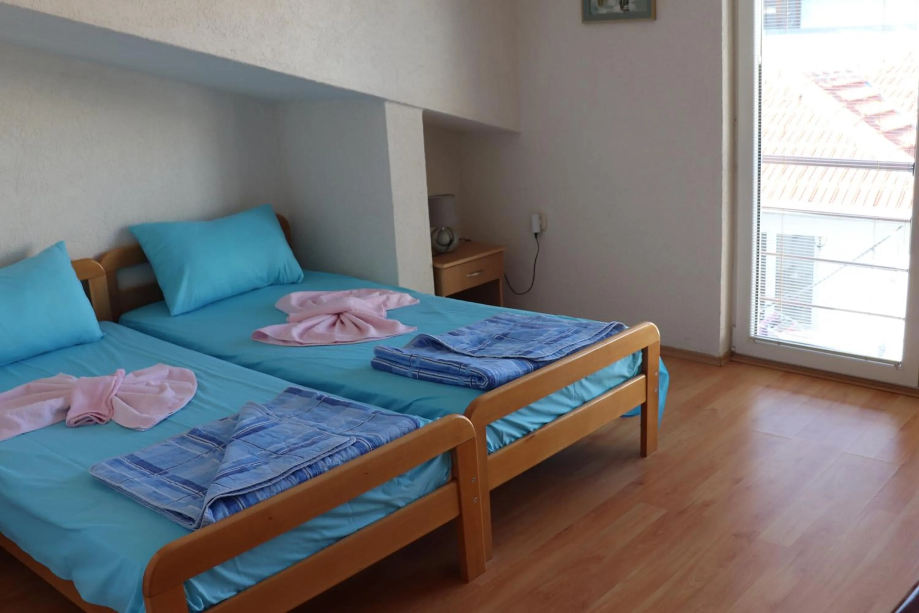 Bed in Bogdanoski Studios & Guest Rooms