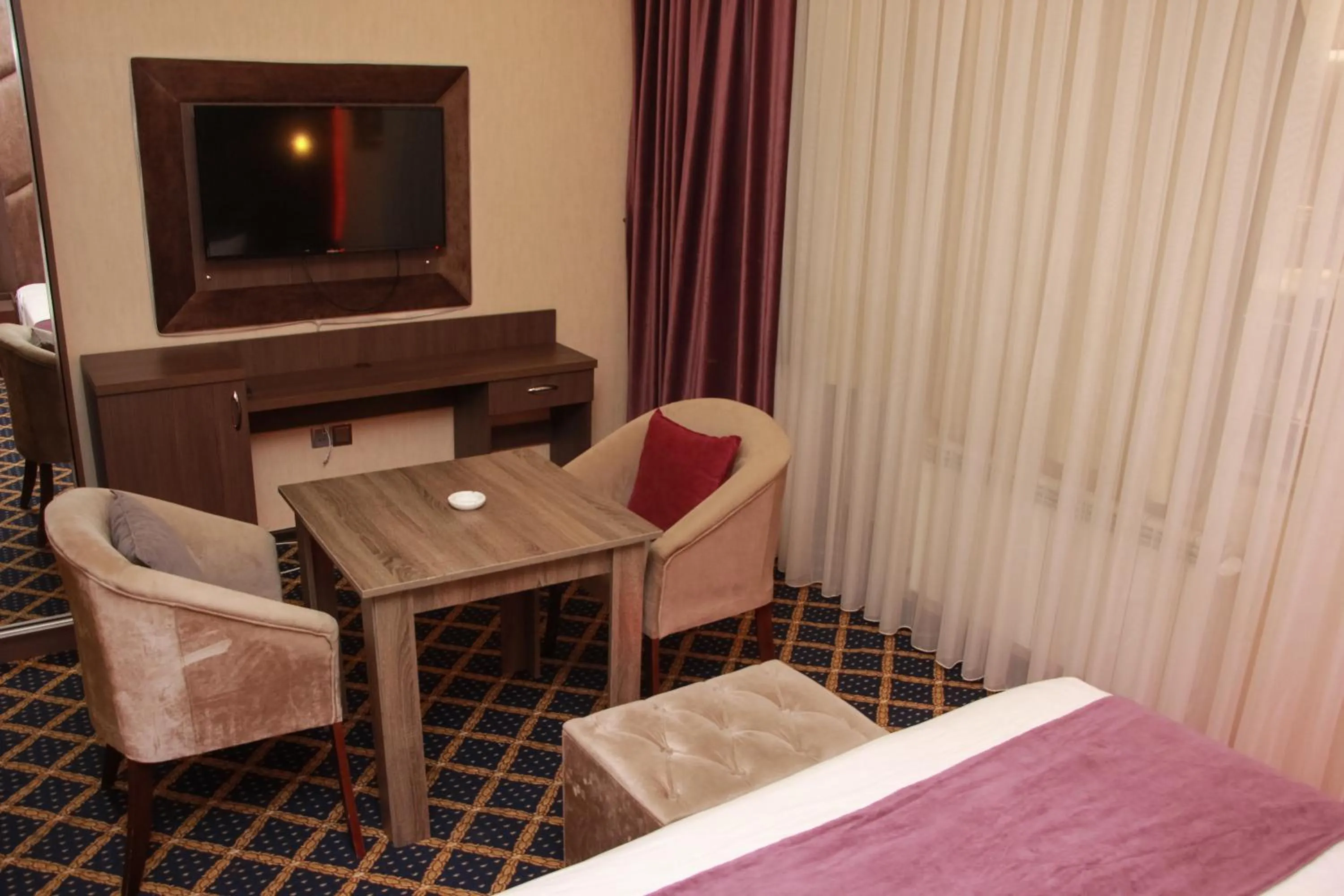 TV and multimedia, Bed in Anatolia Hotel Baku