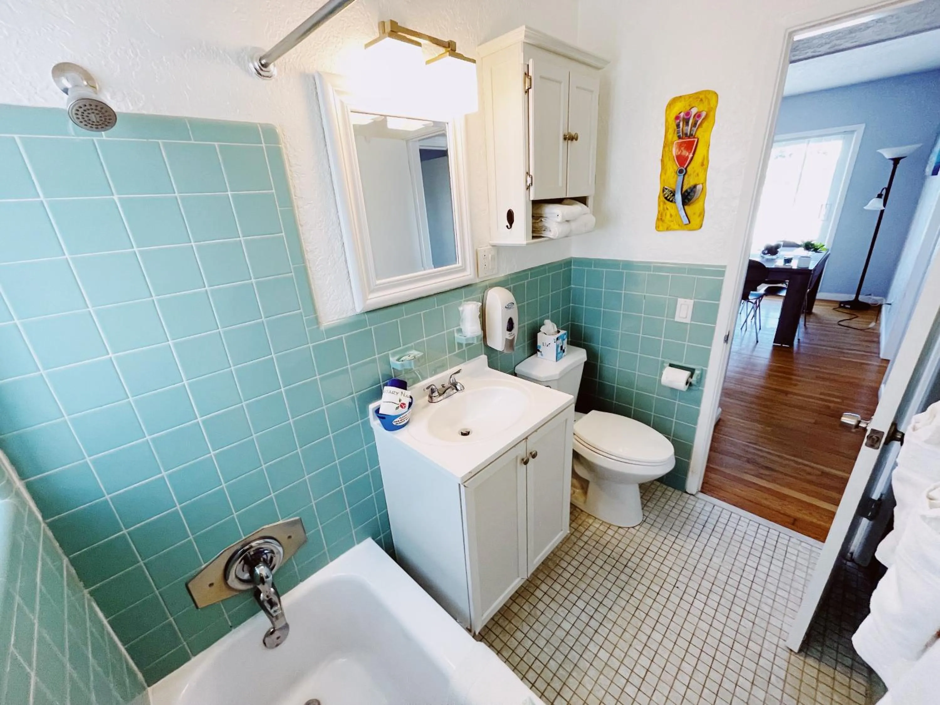 Shower in Great Escape Apartments By Lowkl