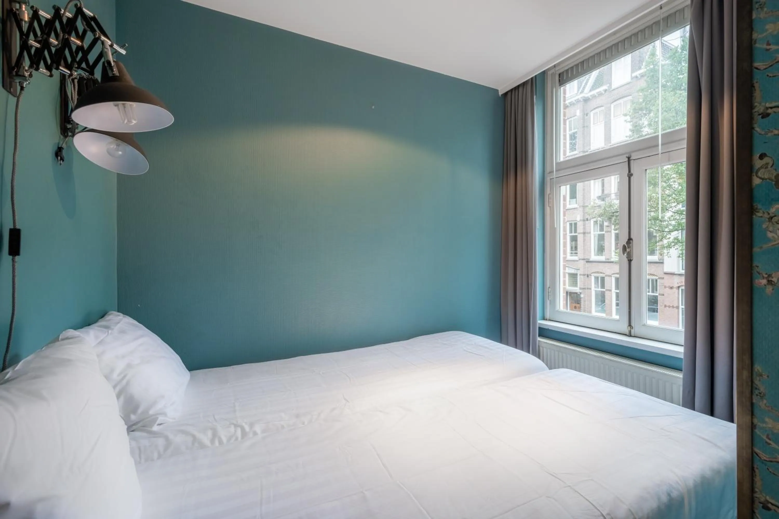 Bed in Musea Hotel & Apartments