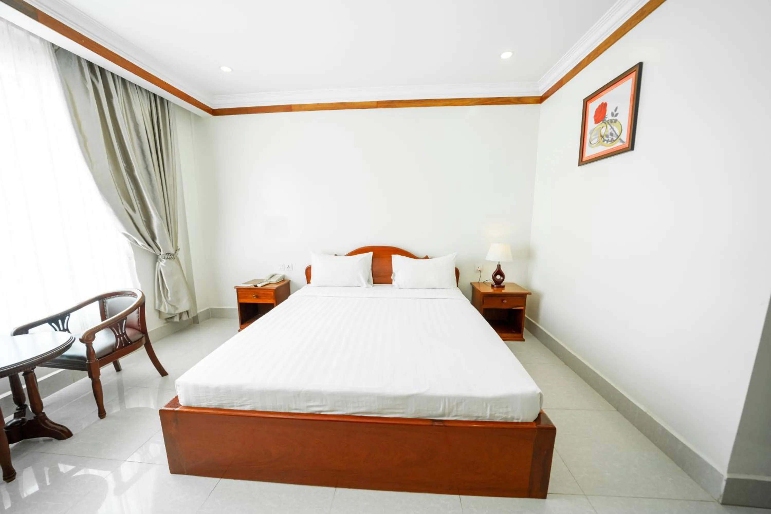 Bed in Pursat Riverside Hotel & Spa