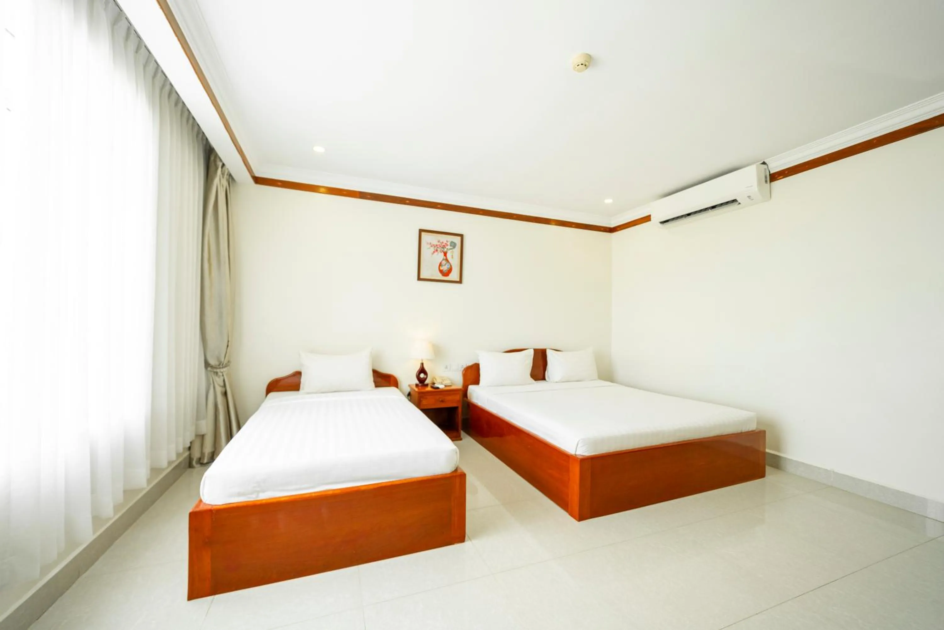 Bed in Pursat Riverside Hotel & Spa