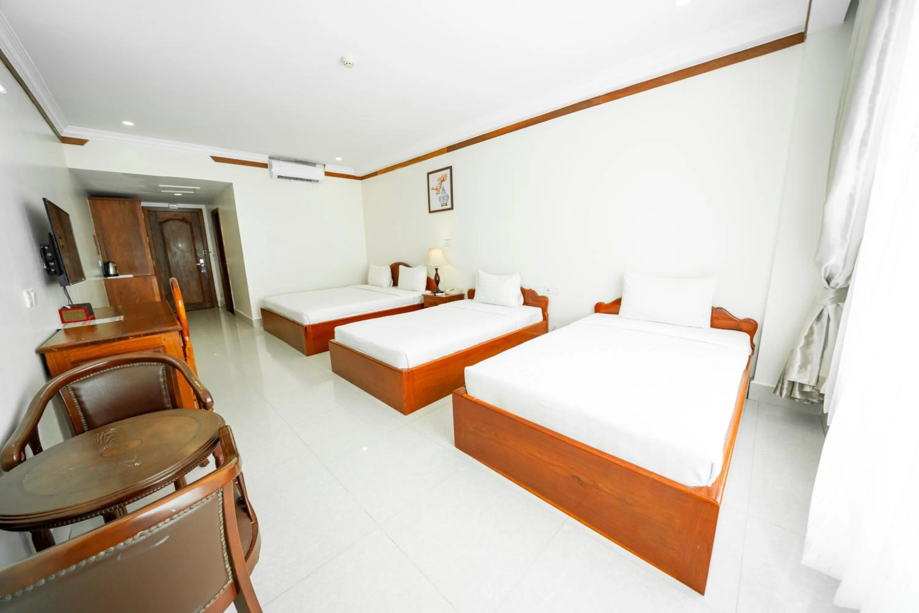 Bed in Pursat Riverside Hotel & Spa