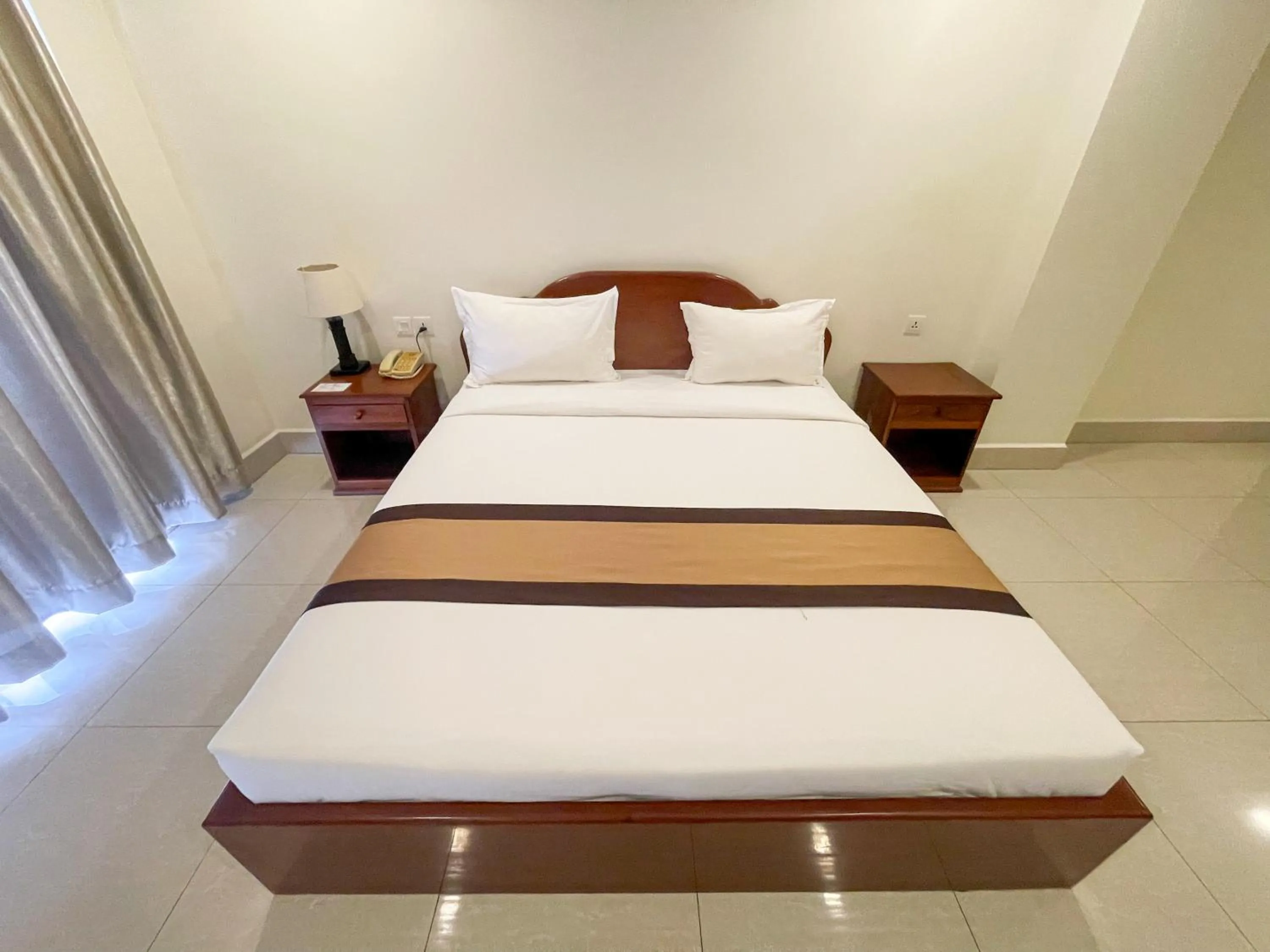 Bed in Pursat Riverside Hotel & Spa