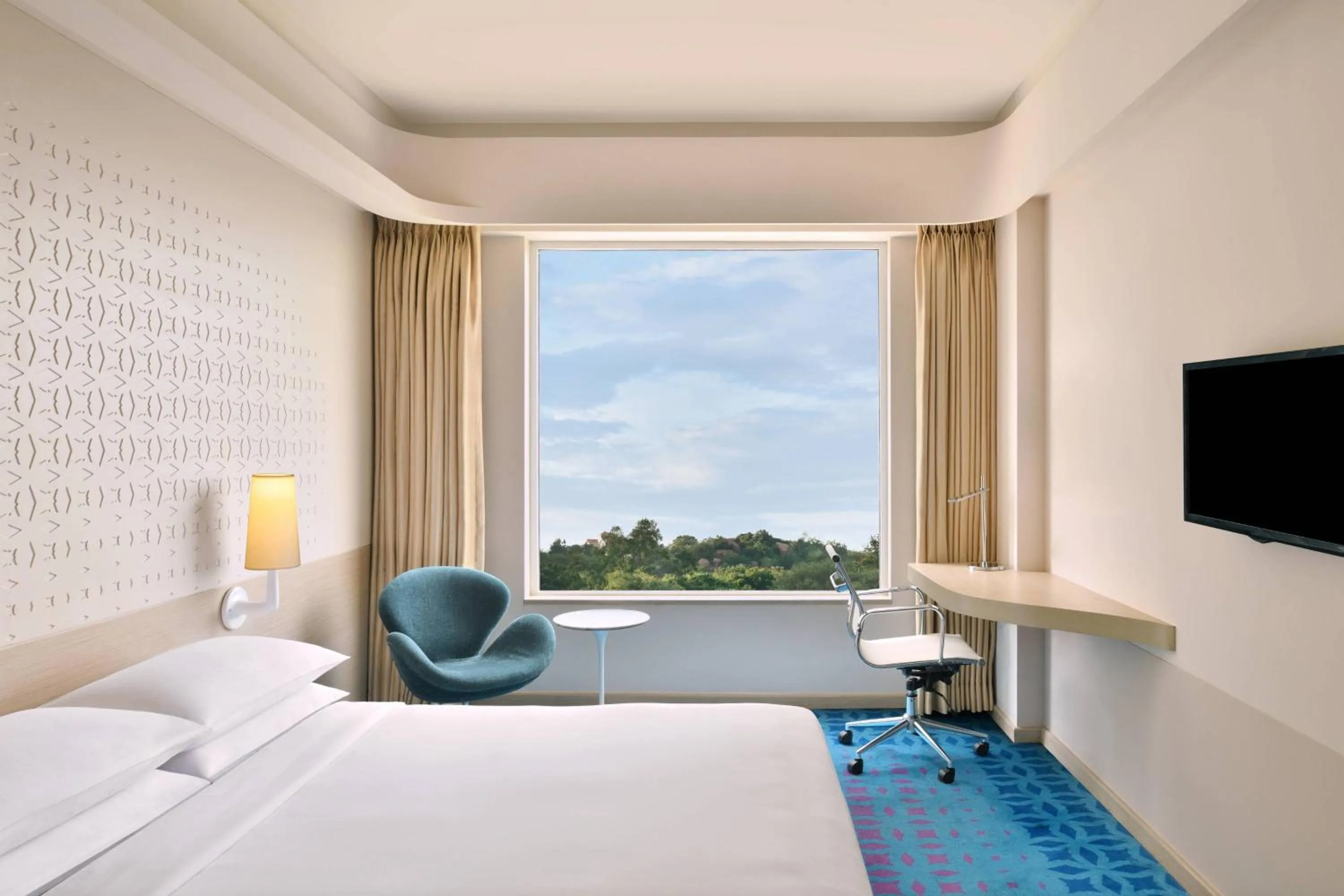 Photo of the whole room, Bed in Fairfield by Marriott Hyderabad Gachibowli