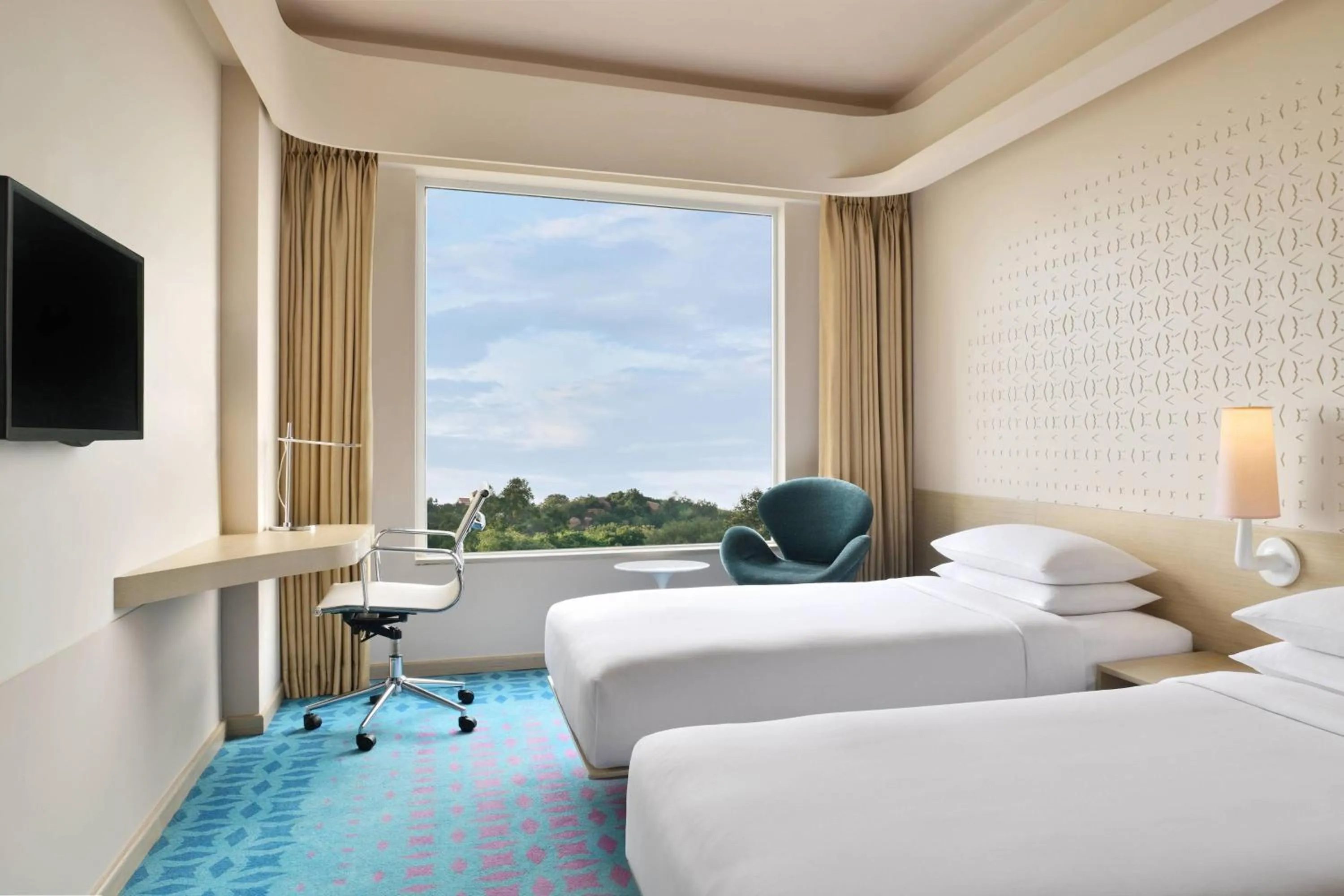 Photo of the whole room, Bed in Fairfield by Marriott Hyderabad Gachibowli