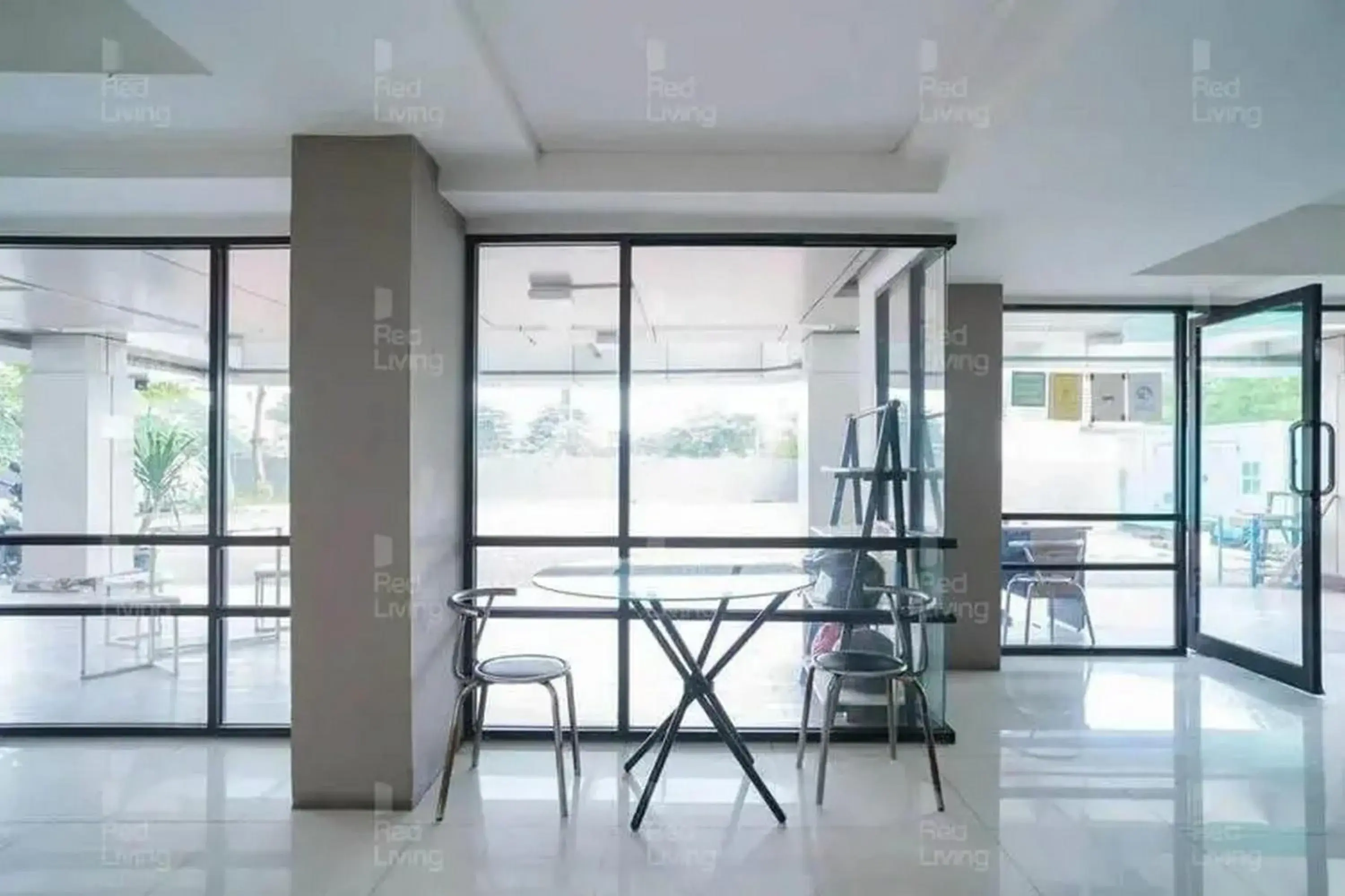 Living room in RedLiving Apartemen 19 Avenue - Amanah Room Living room in RedLiving Apartemen 19 Avenue - Amanah Room