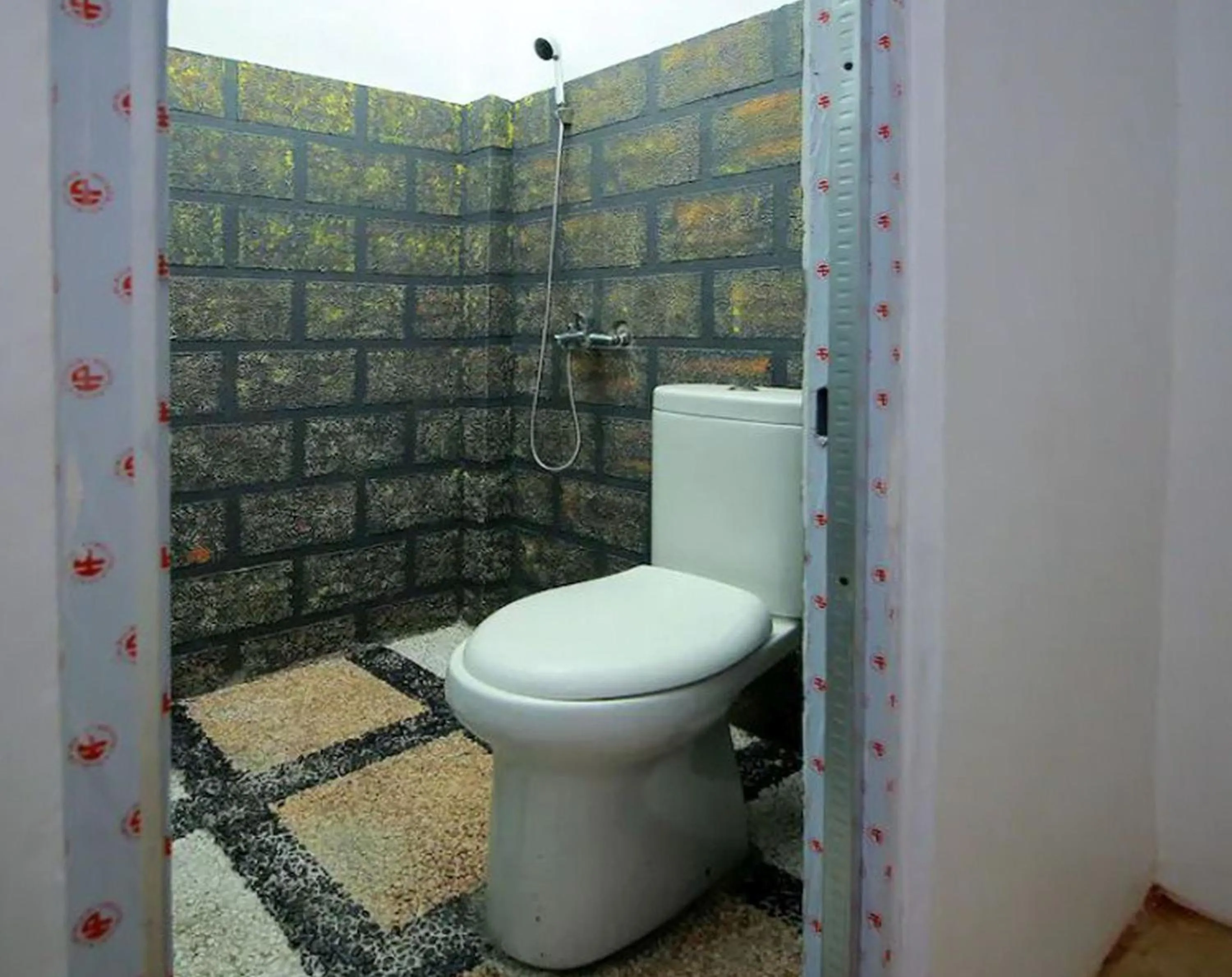 Bathroom in RedDoorz Syariah near Universitas Bengkulu