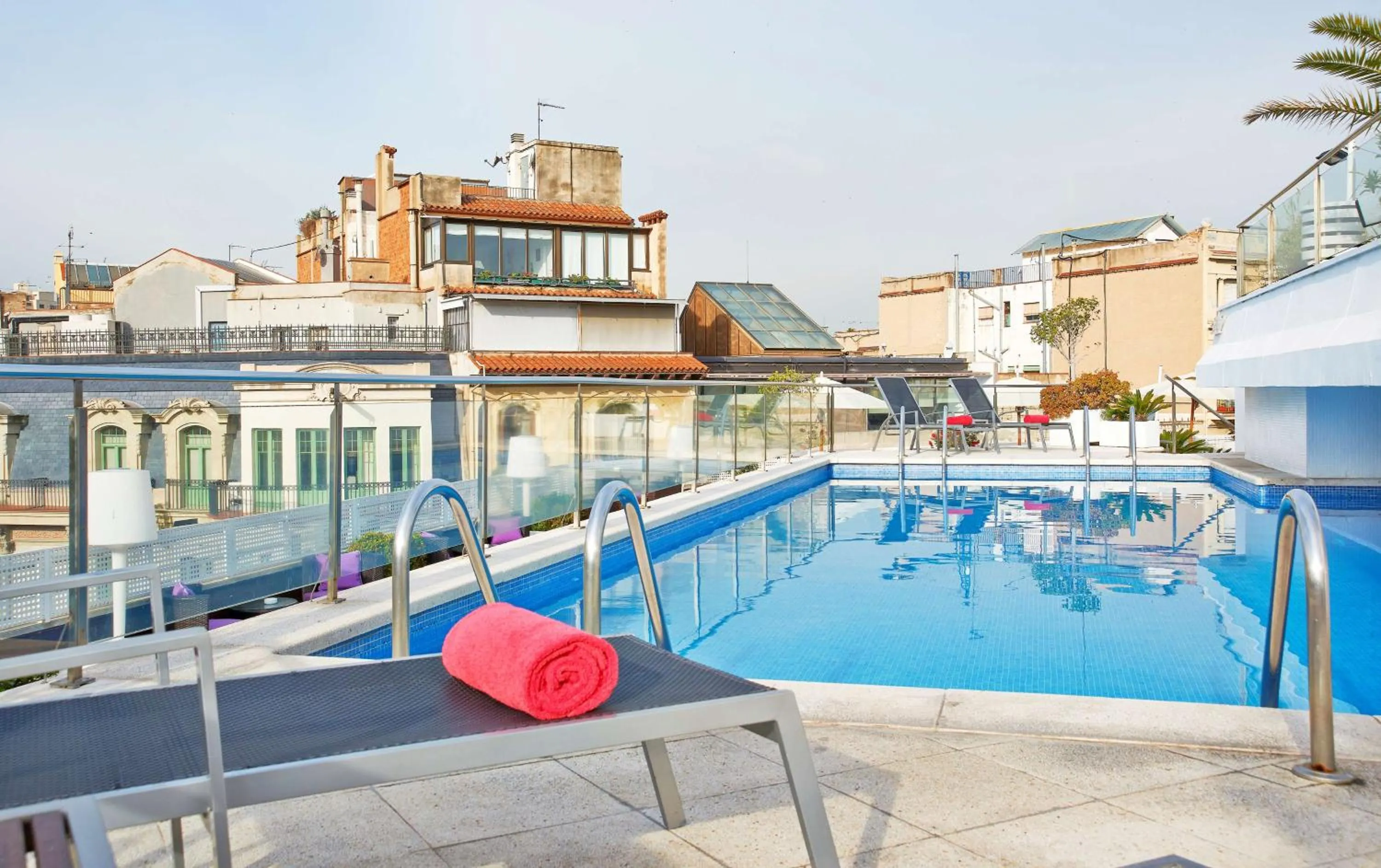 Pool view in NH Collection Barcelona Podium