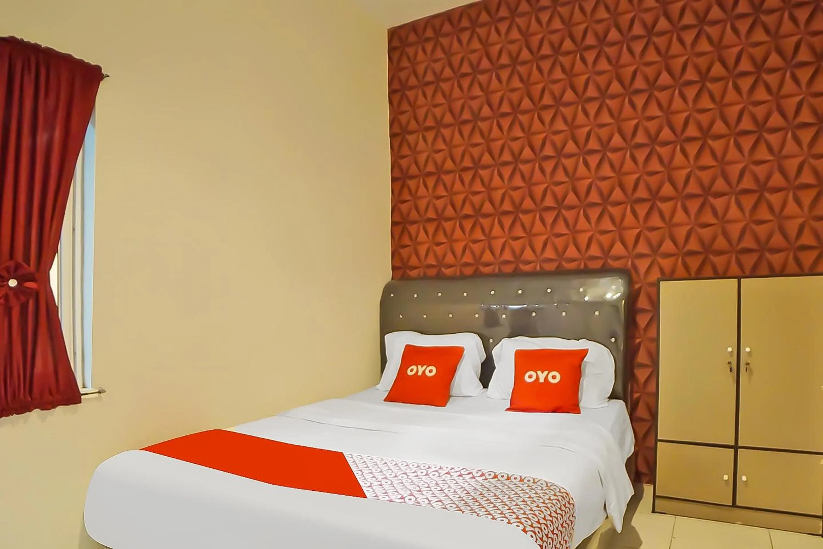 Bedroom in Hotel O N Guesthouse