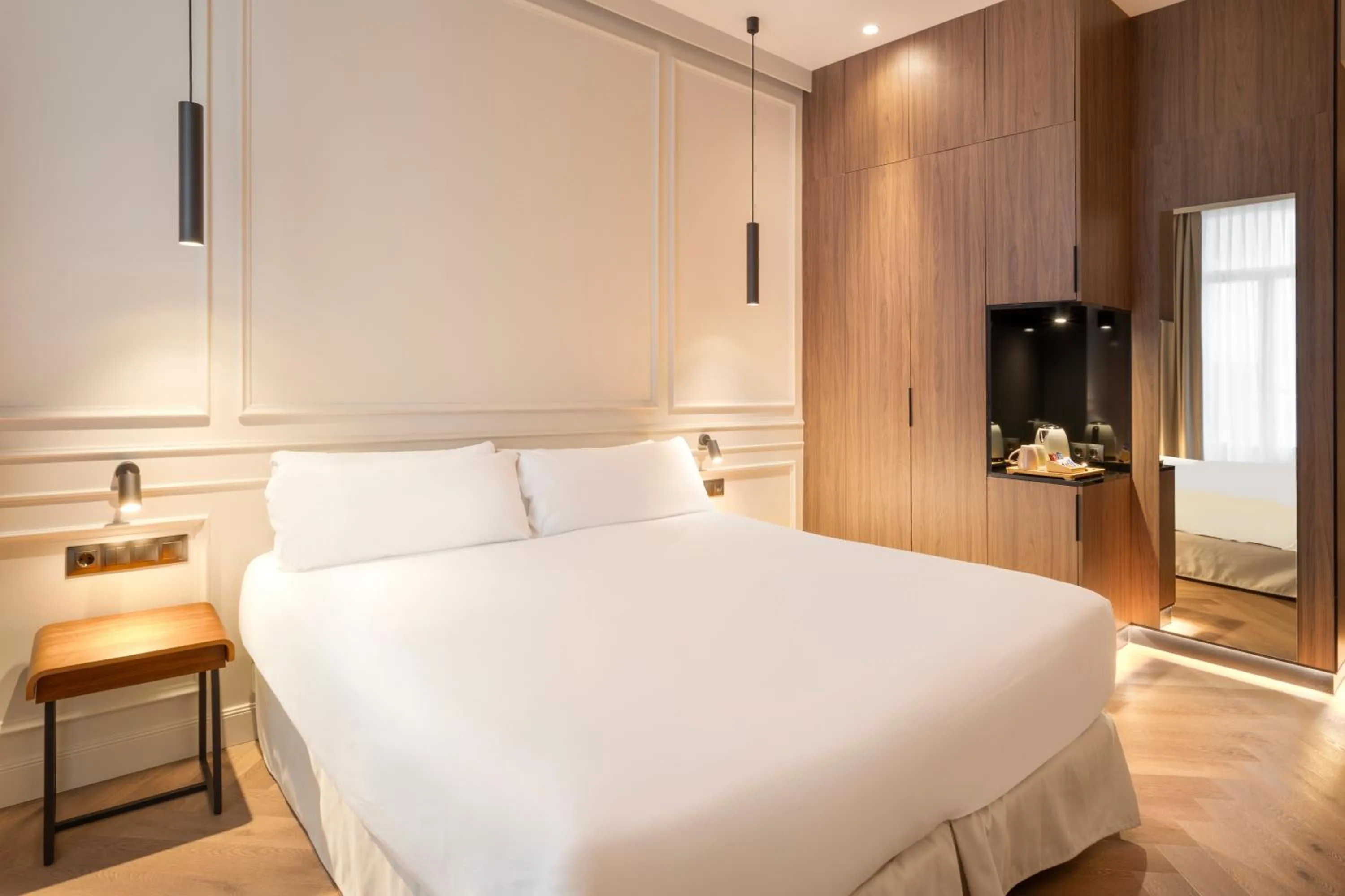 Bed in Bilder Boutique Hotel