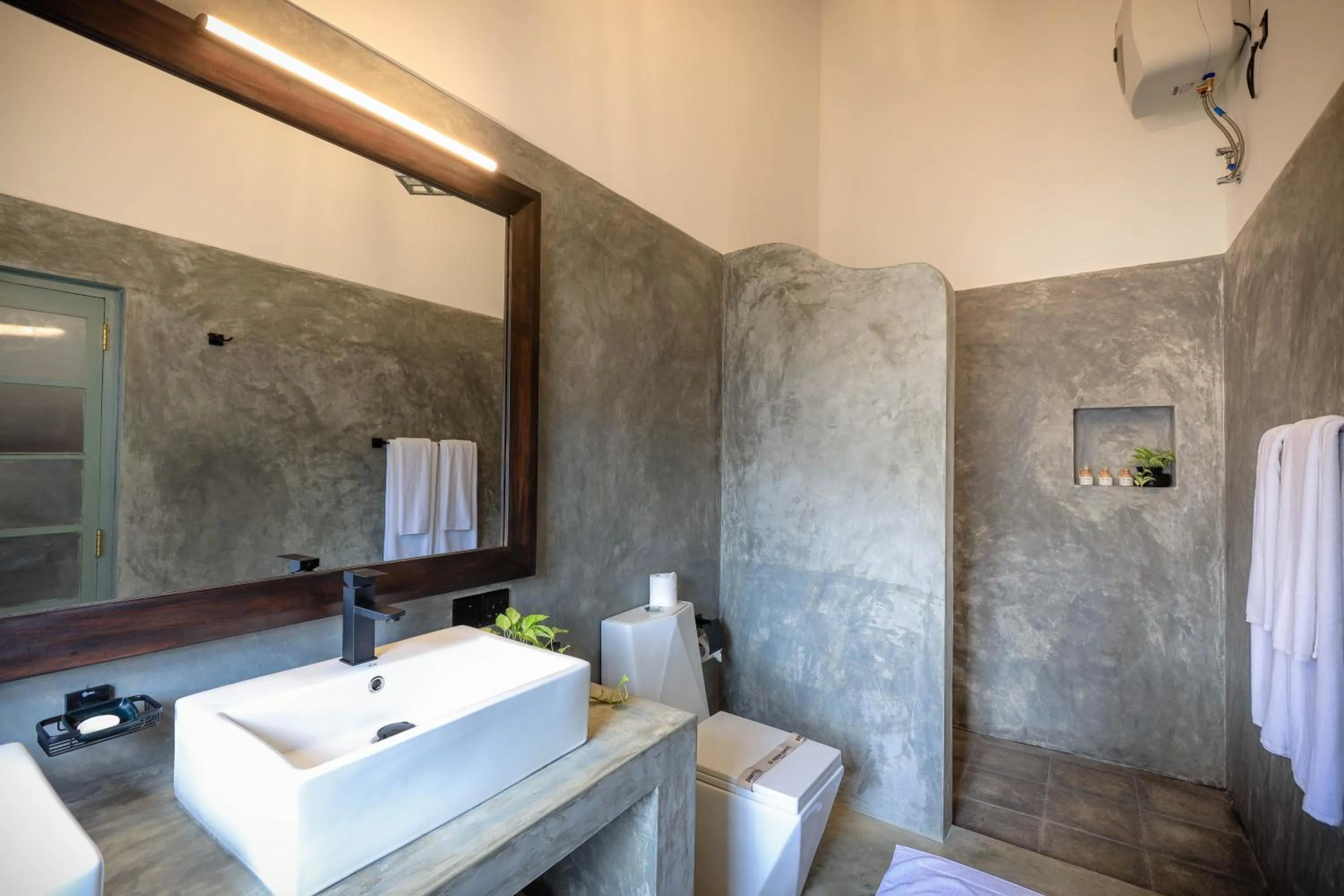 Bathroom in Moi Talpe by DBI