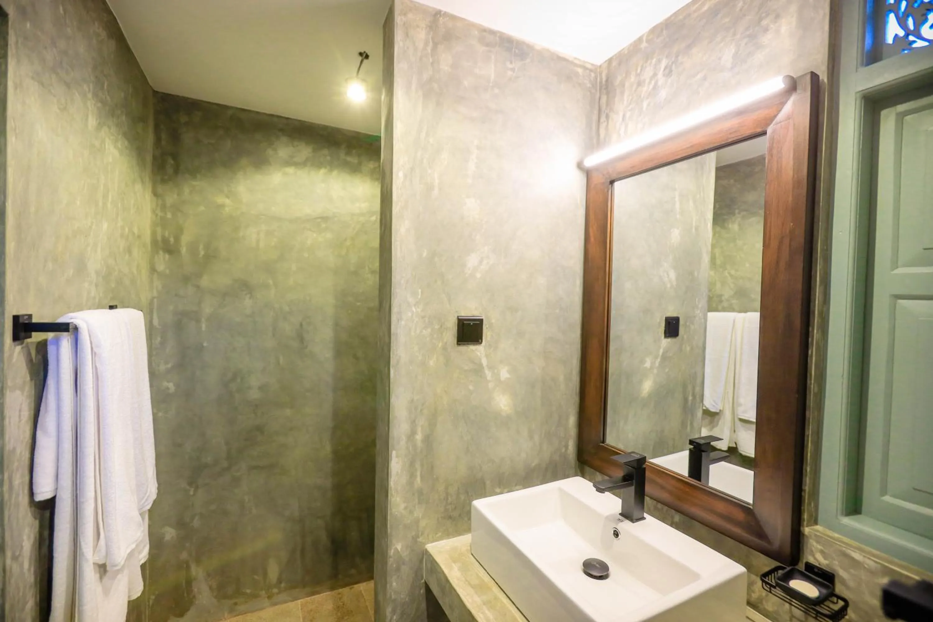 Bathroom in Moi Talpe by DBI