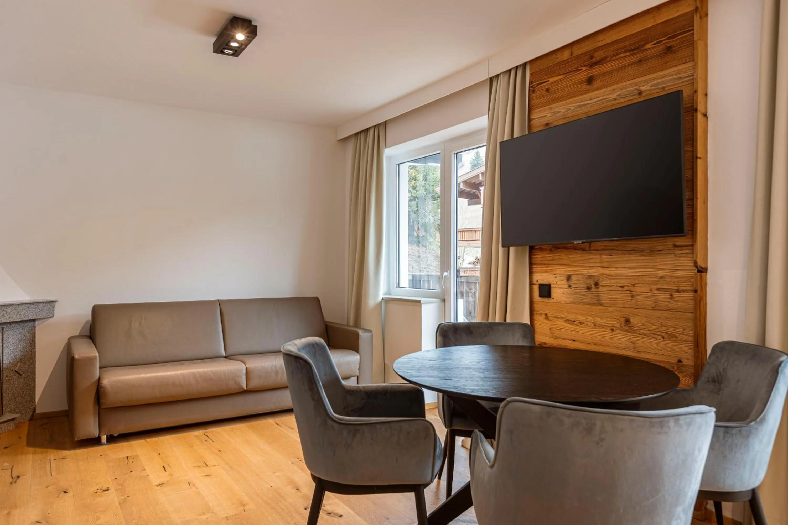 Living room in Saalbach Suites by ALPS RESORTS