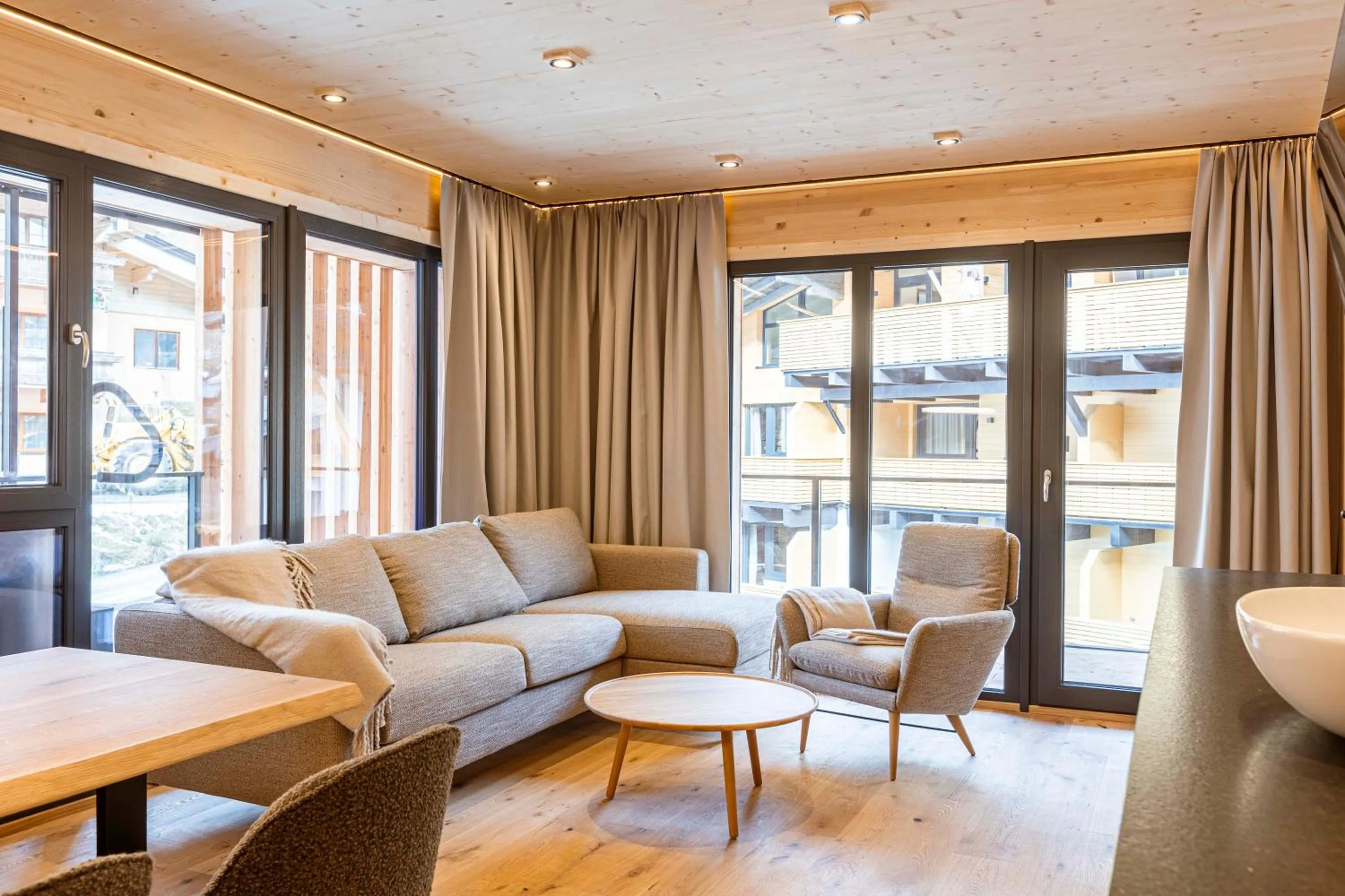 Living room in Saalbach Suites by ALPS RESORTS
