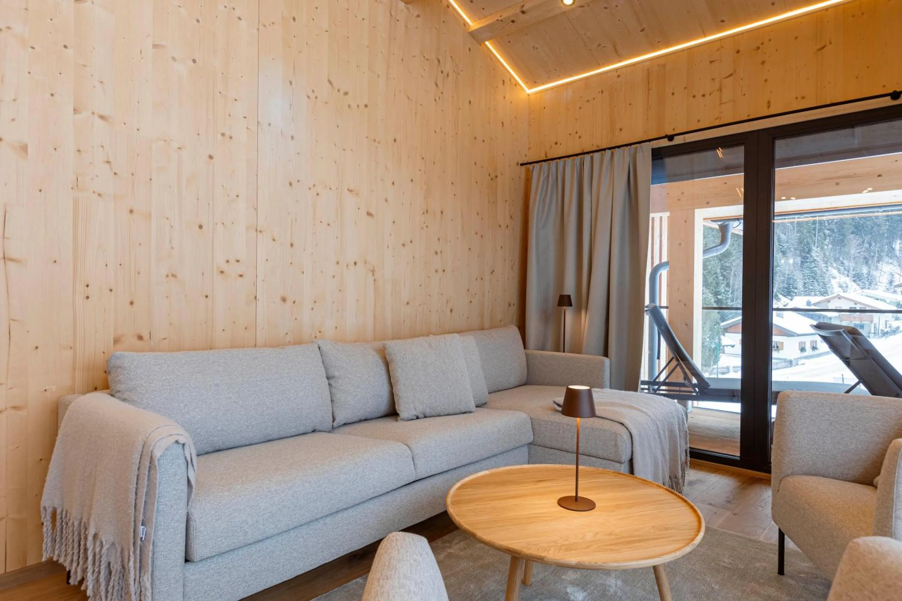 Living room in Saalbach Suites by ALPS RESORTS