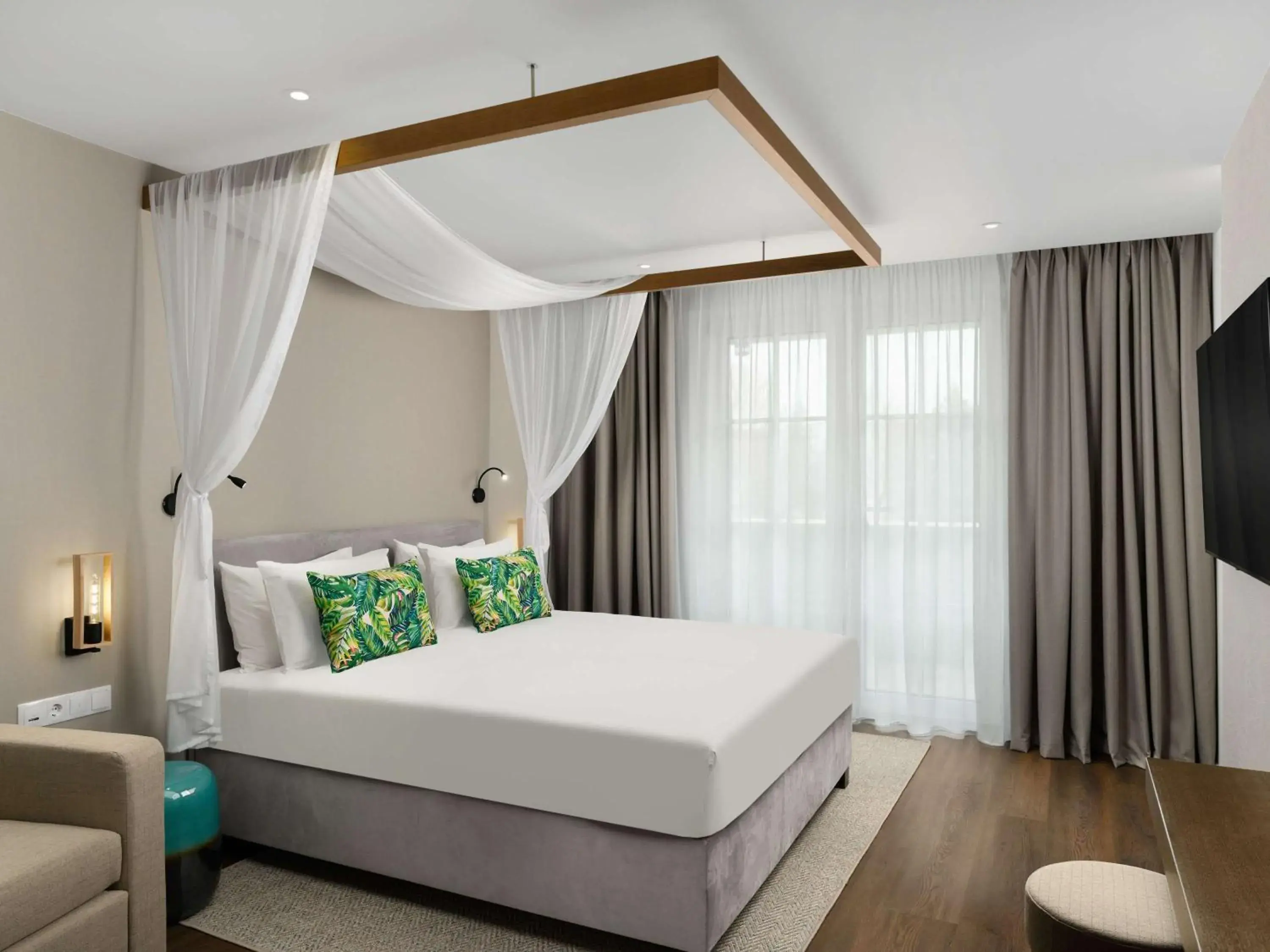 Bedroom, Bed in Mövenpick Balaland Resort Lake Balaton Bedroom, Bed in Mövenpick Balaland Resort Lake Balaton