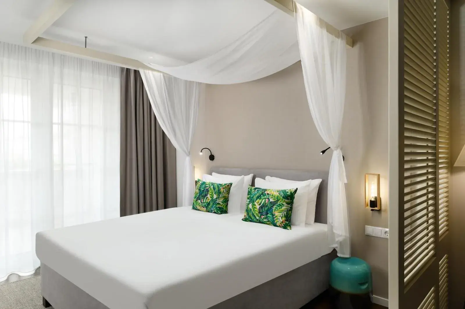 Property building, Bed in Mövenpick Balaland Resort Lake Balaton Property building, Bed in Mövenpick Balaland Resort Lake Balaton