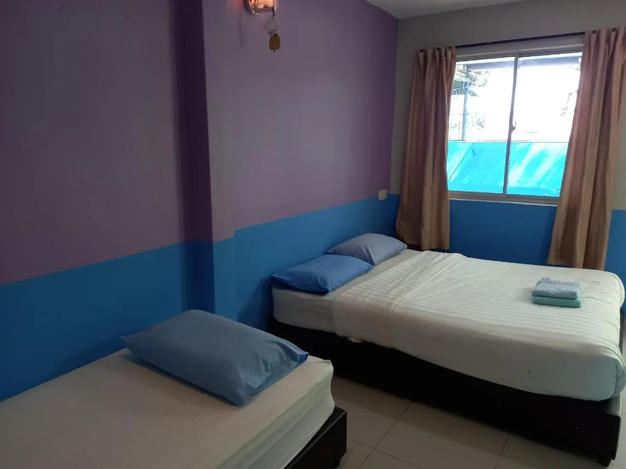 Bed in Tengkera Hotel