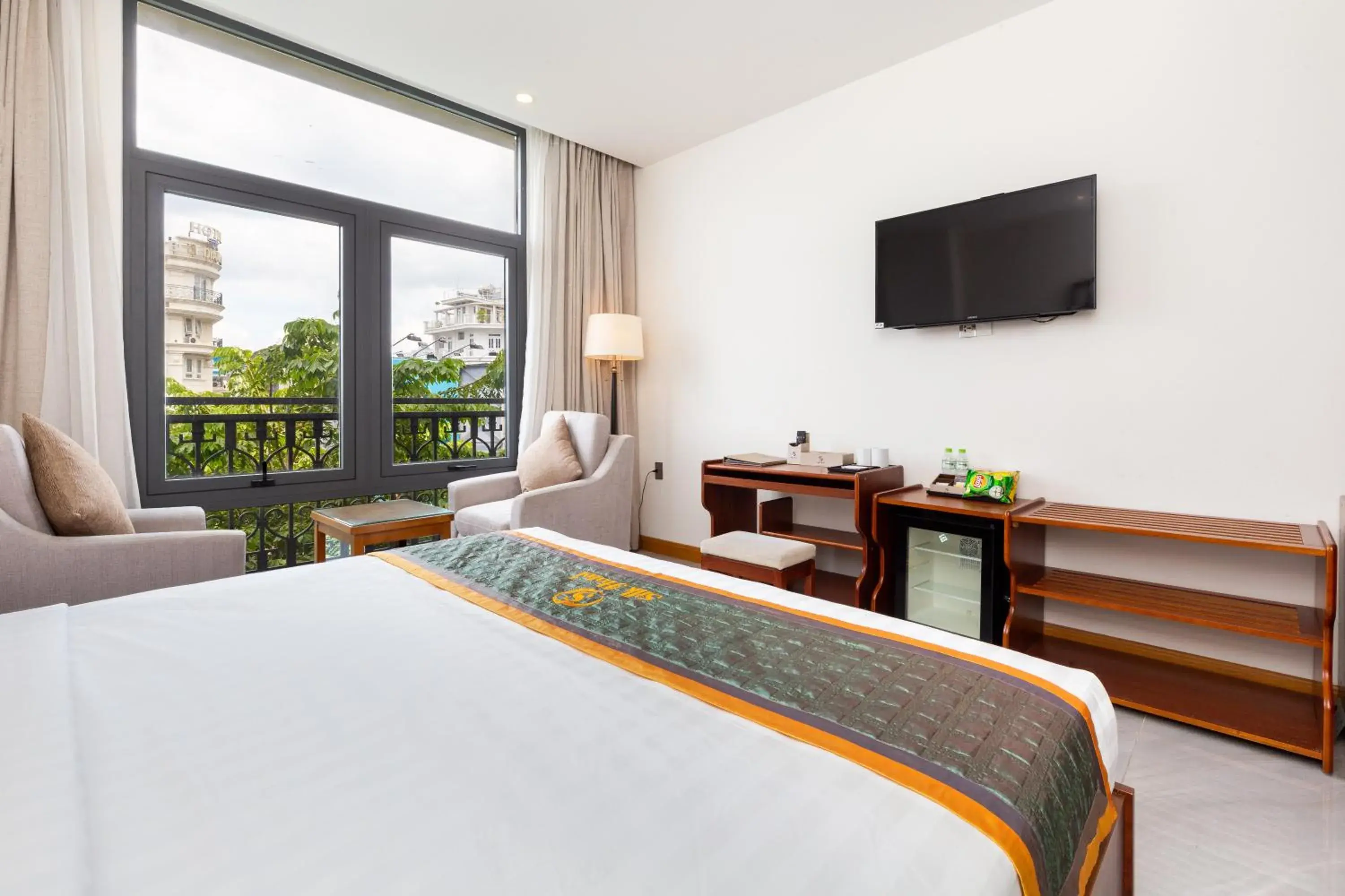 TV and multimedia, Bed in Silk Hong Ha airport hotel TV and multimedia, Bed in Silk Hong Ha airport hotel